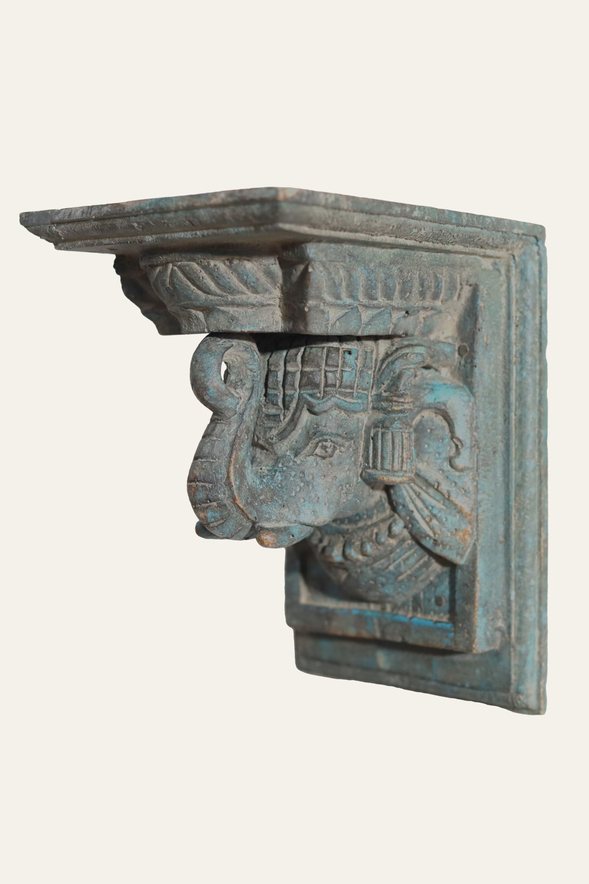 carved elephant motif wooden wall bracket