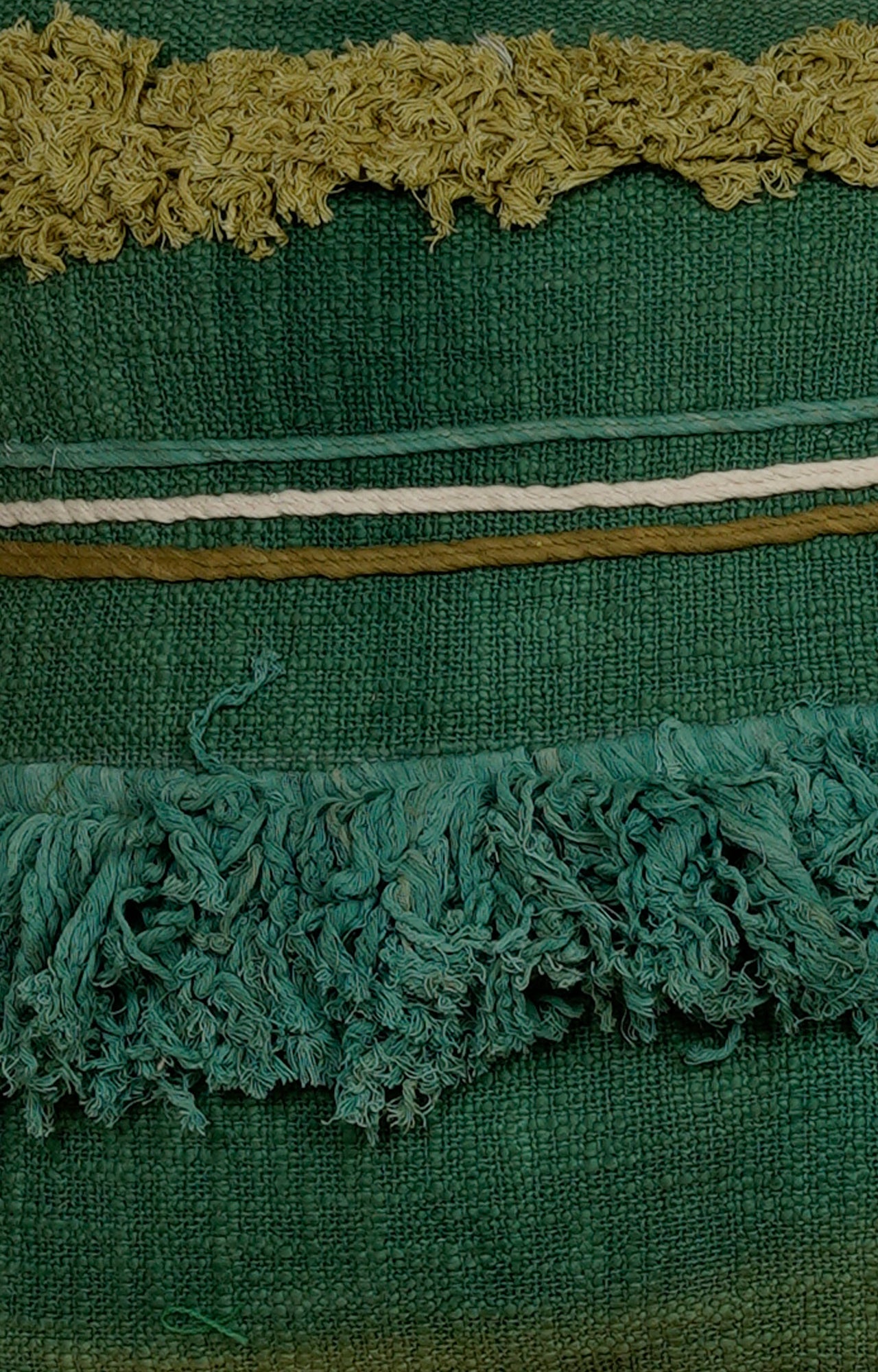Green Textured Cushion with Layered Fringes