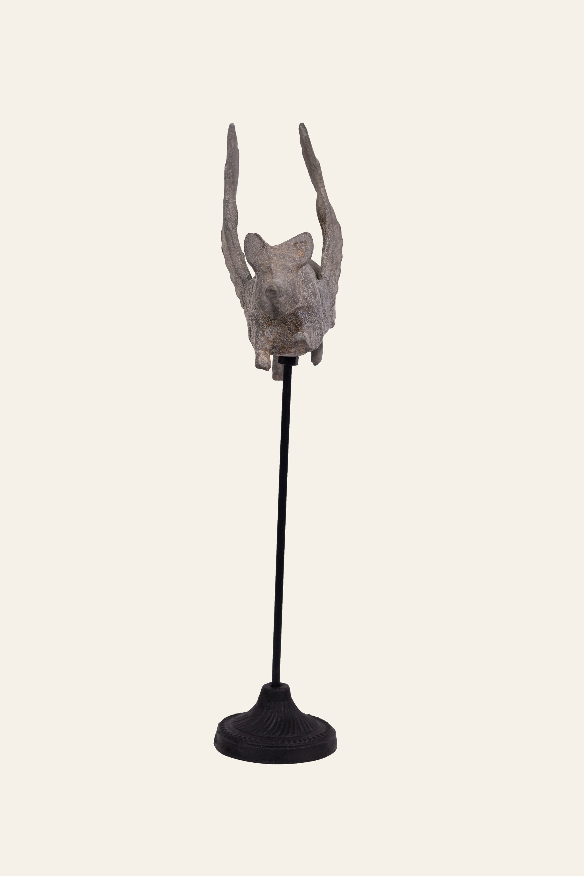flying pig on pedestal sculpture