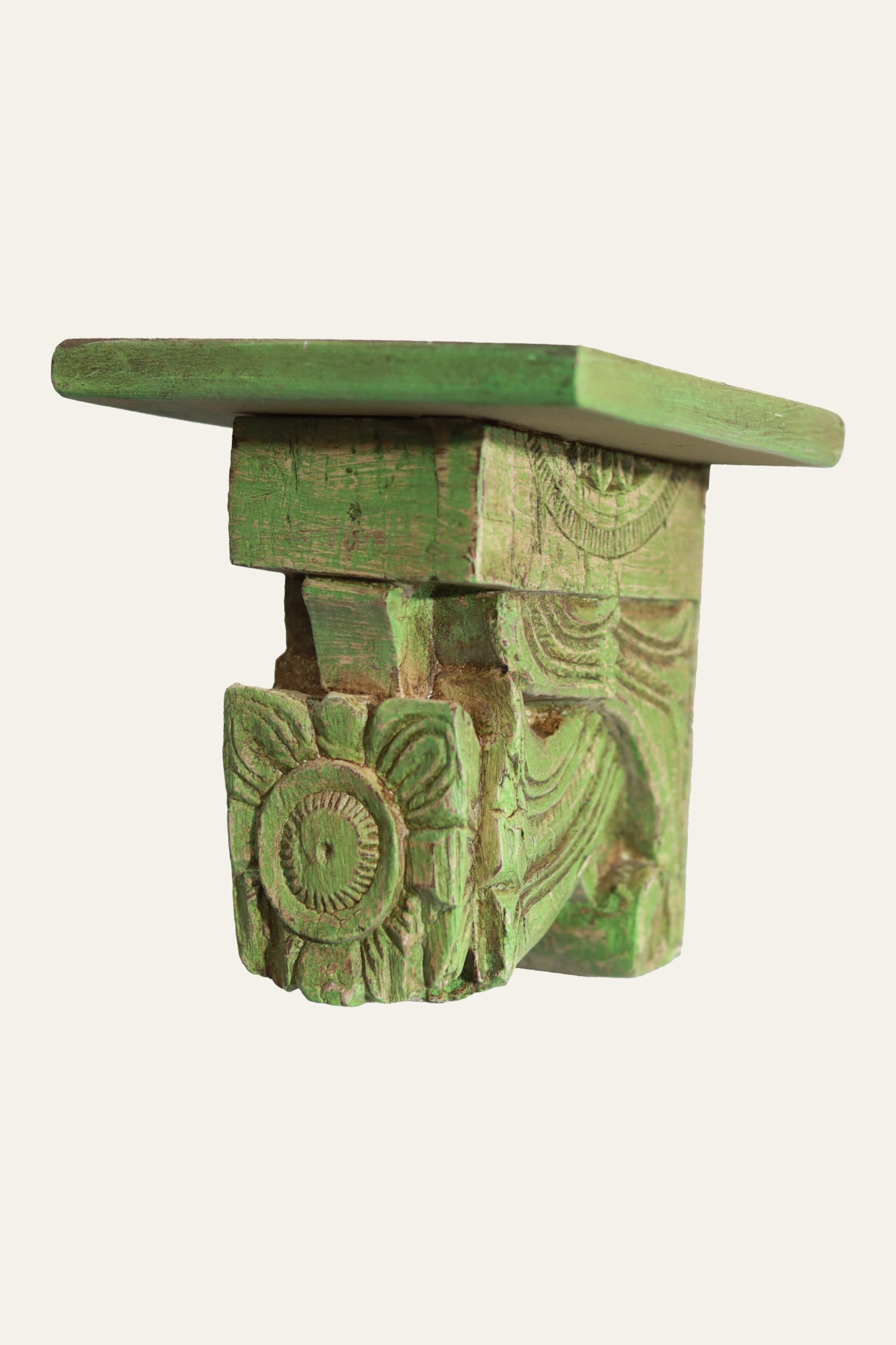 green floral carved wooden wall bracket