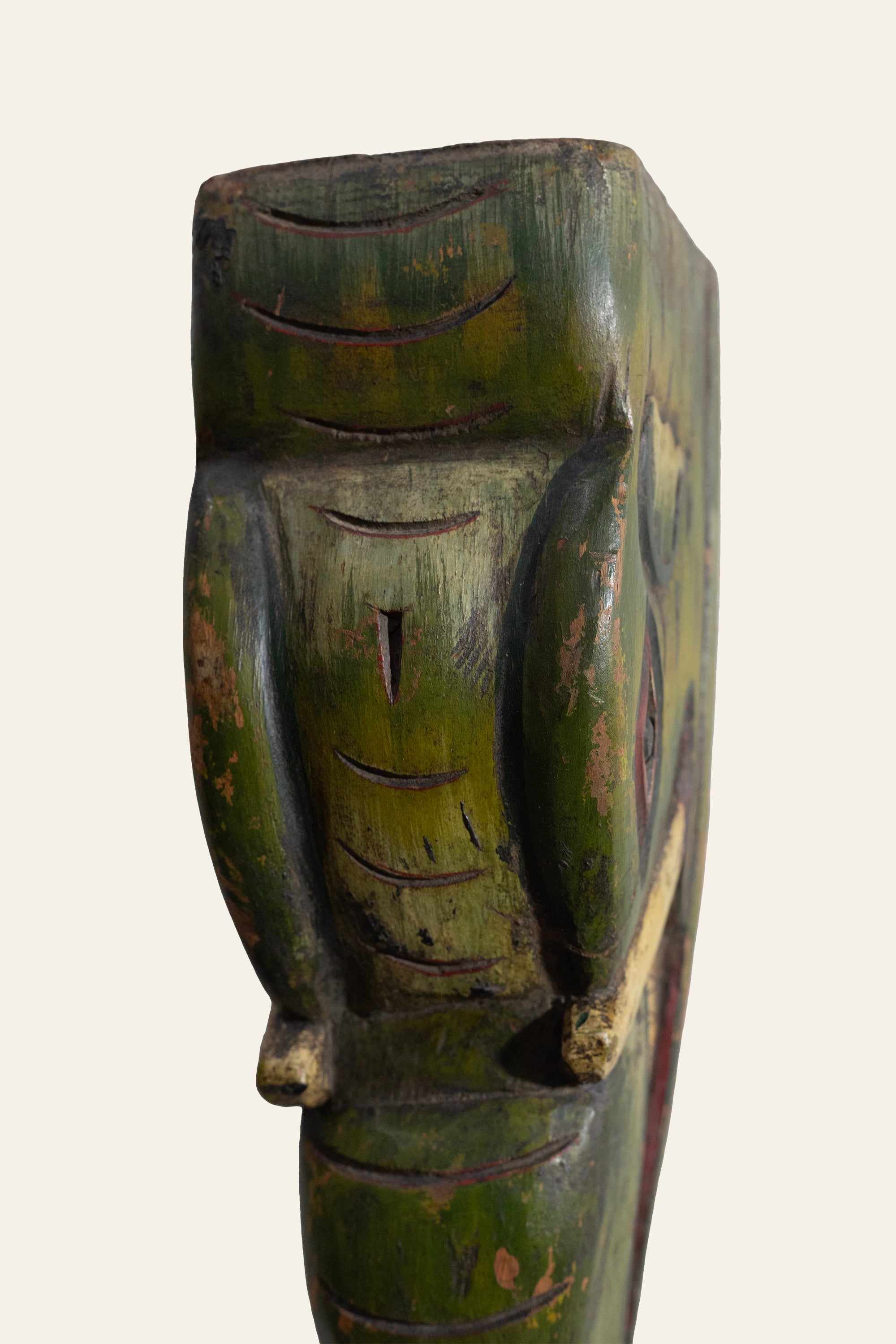 green wooden wall corbel