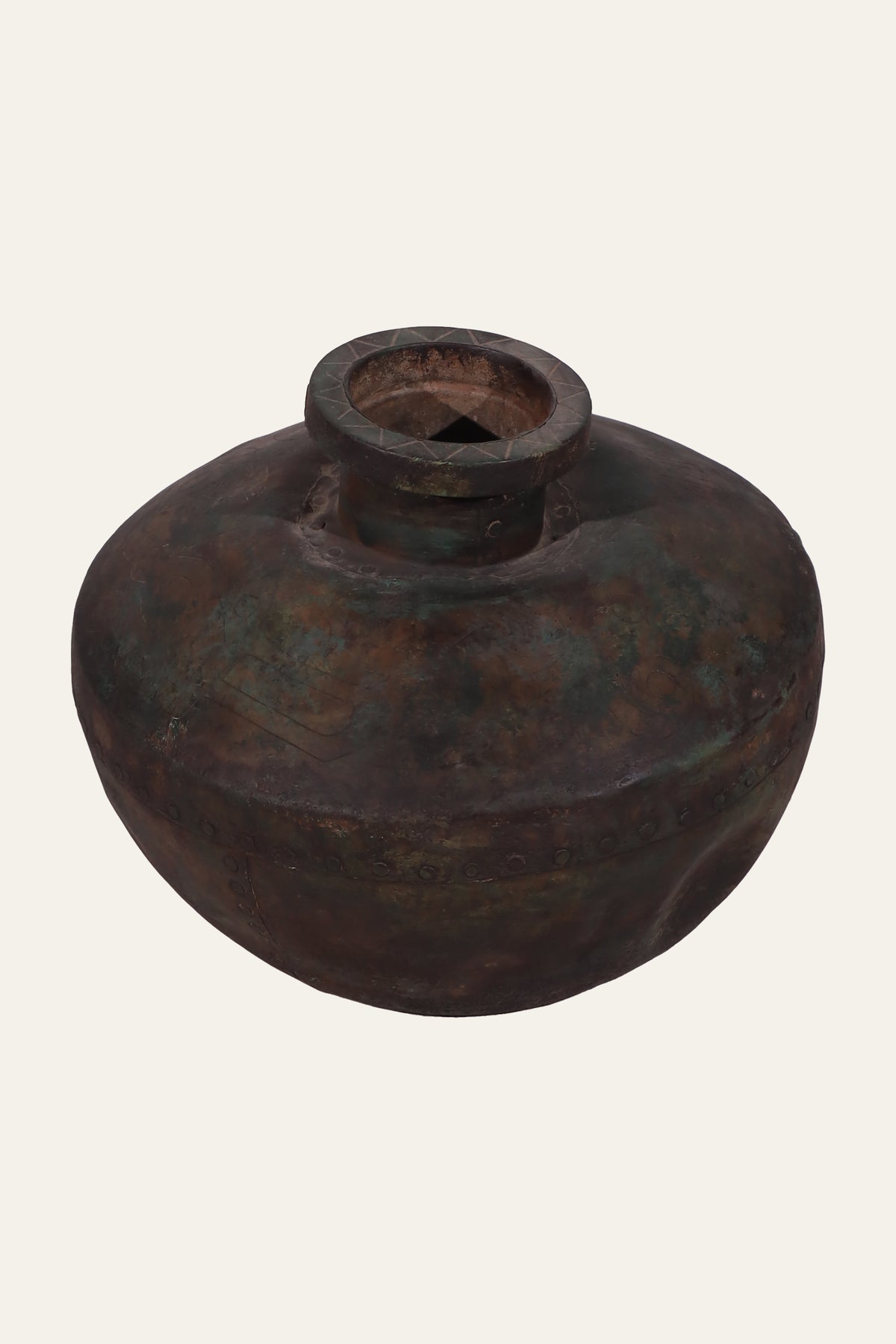 handcrafted antique metal vessel