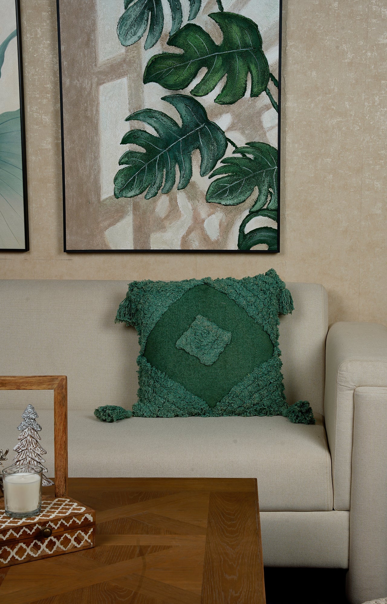 Green Tufted Cushion with Tassel Detailing