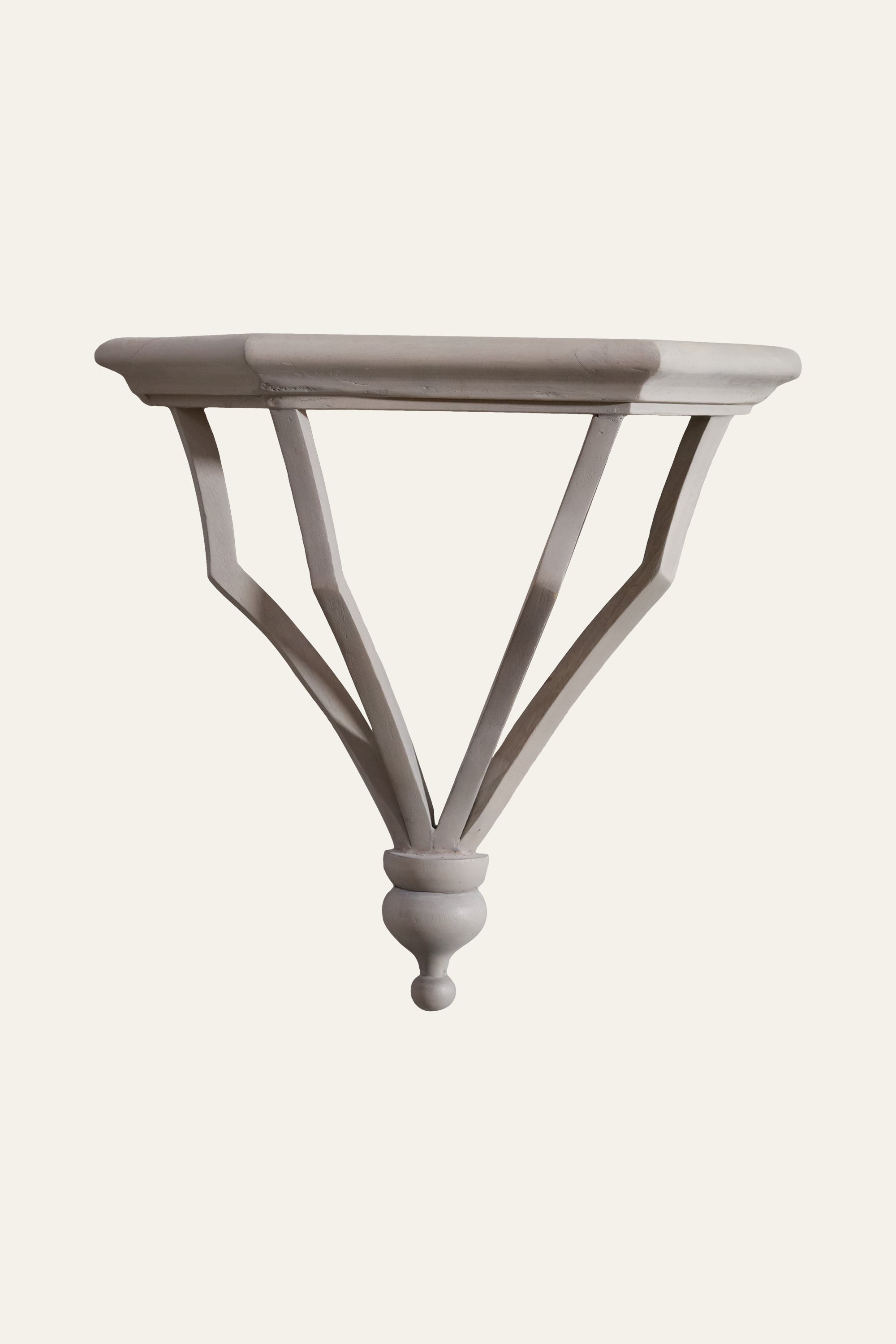 white wooden wall bracket with curved support