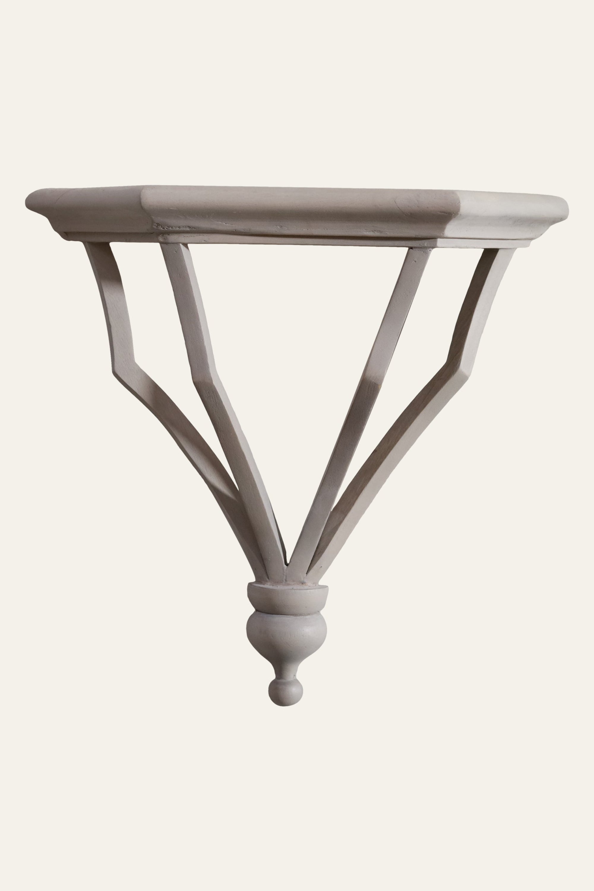 white wooden wall bracket with curved support