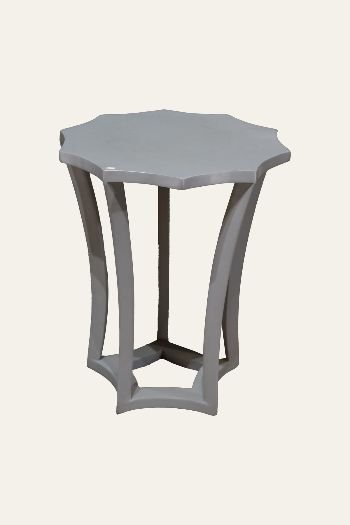 wooden accent table with scalloped top