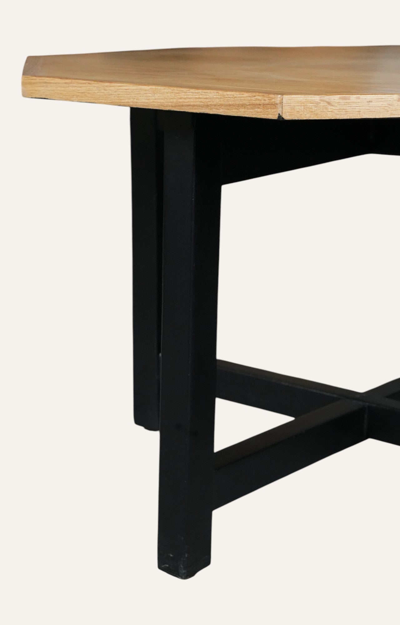 Wooden table with black legs 