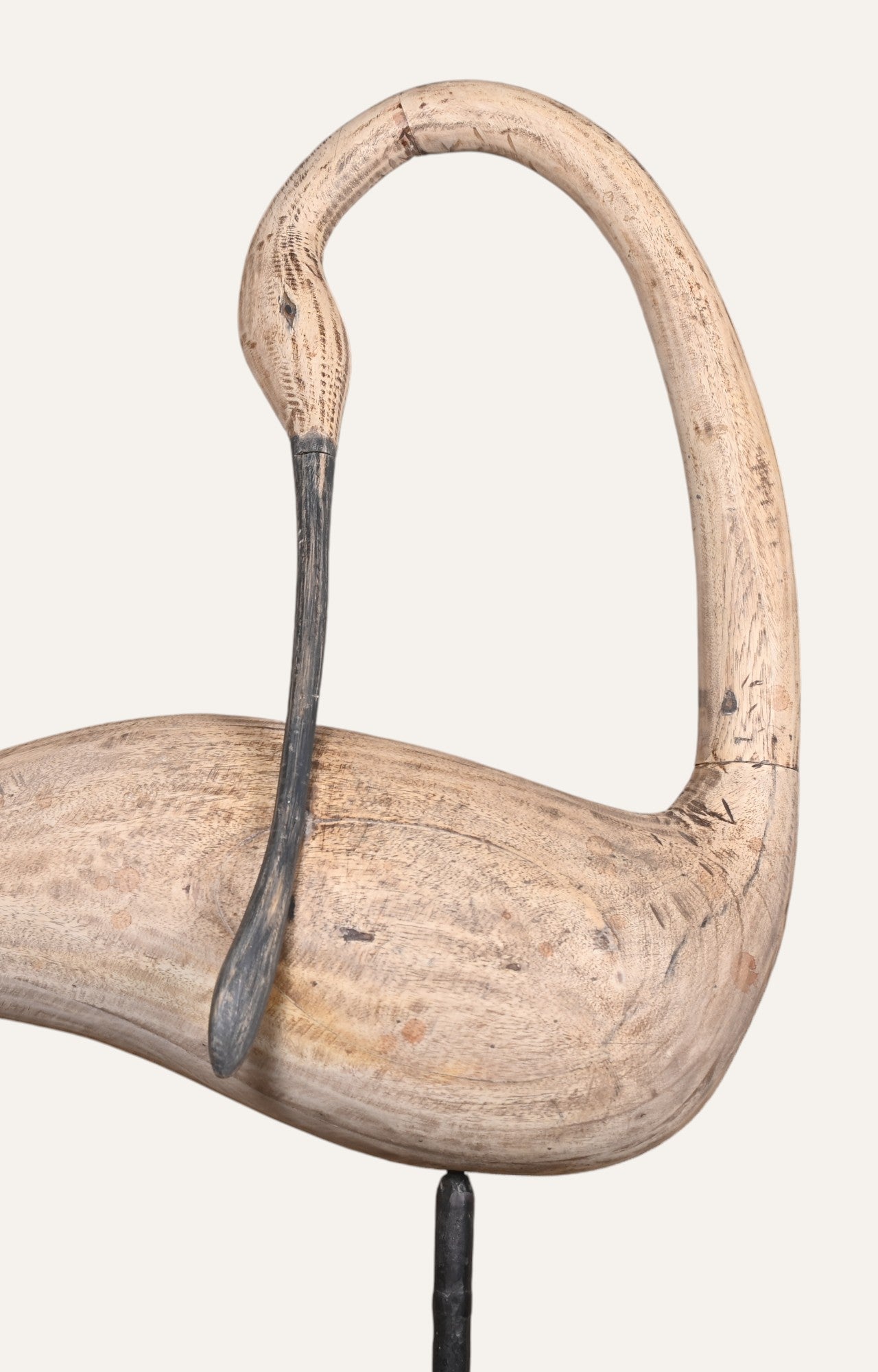 Wooden flamingo sculpture