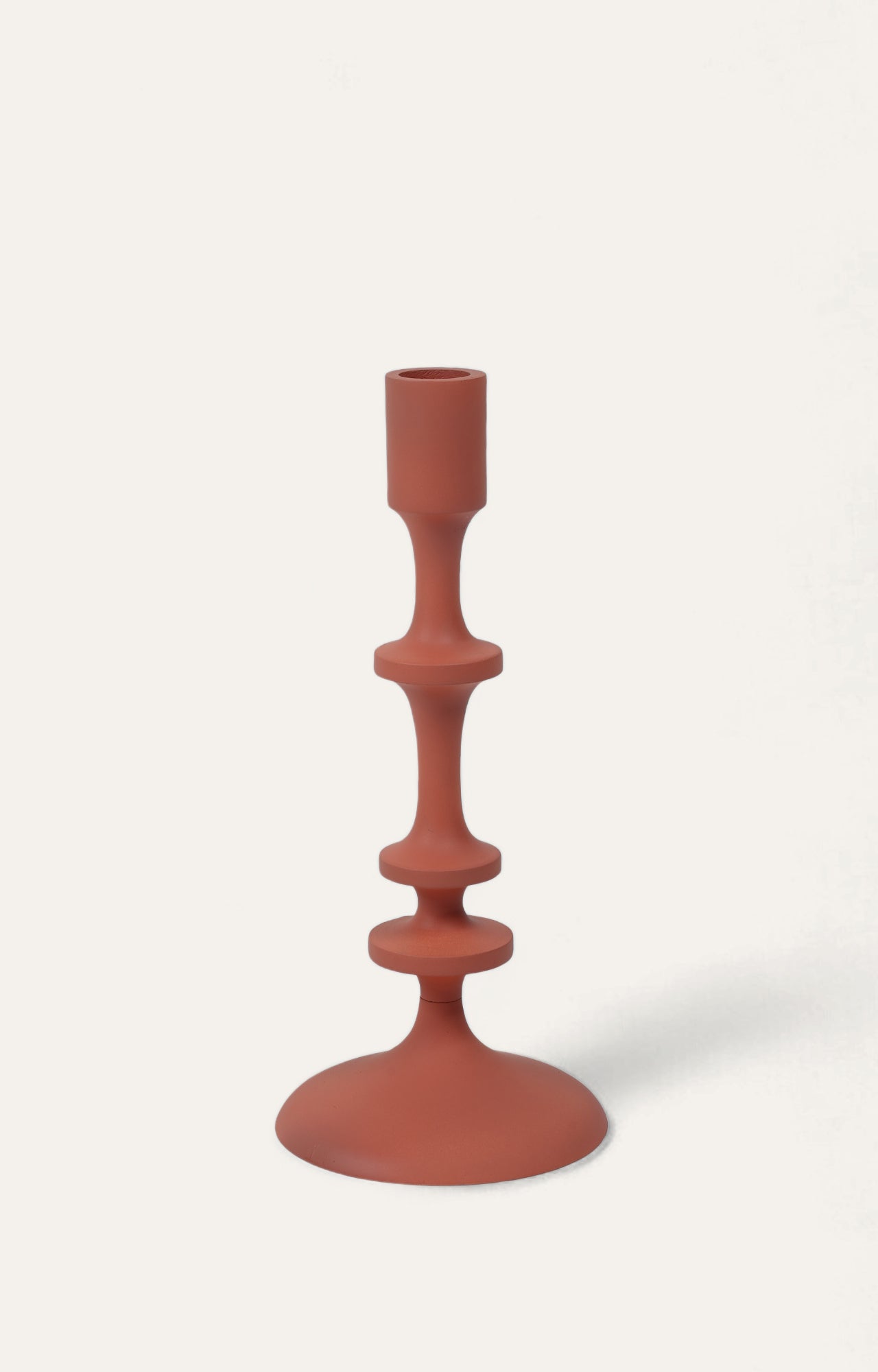 Timeless Elegance: The Enchanting Allure of a Vintage Reddish Metal Candle Stand