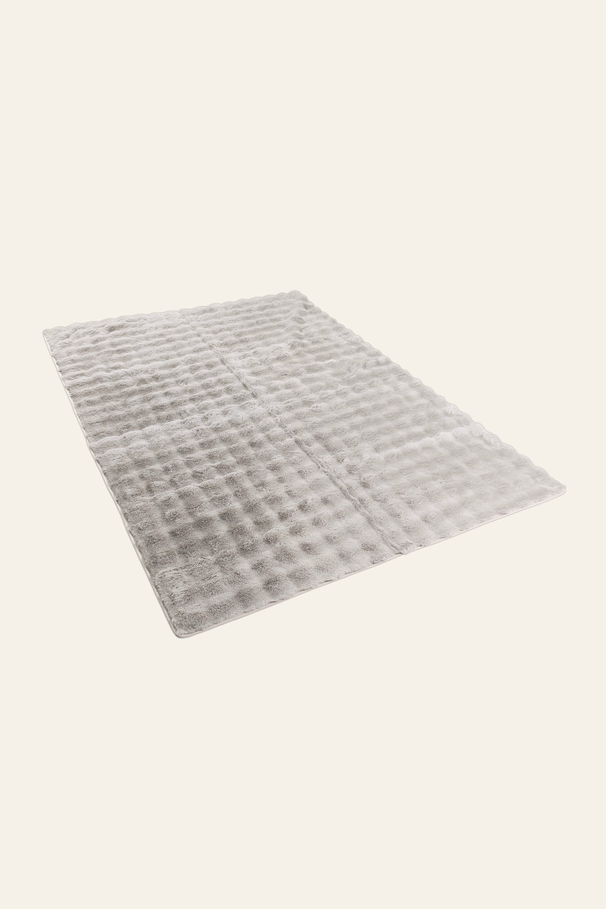 Soft Grey Fur Bed Throw for Modern Interiors