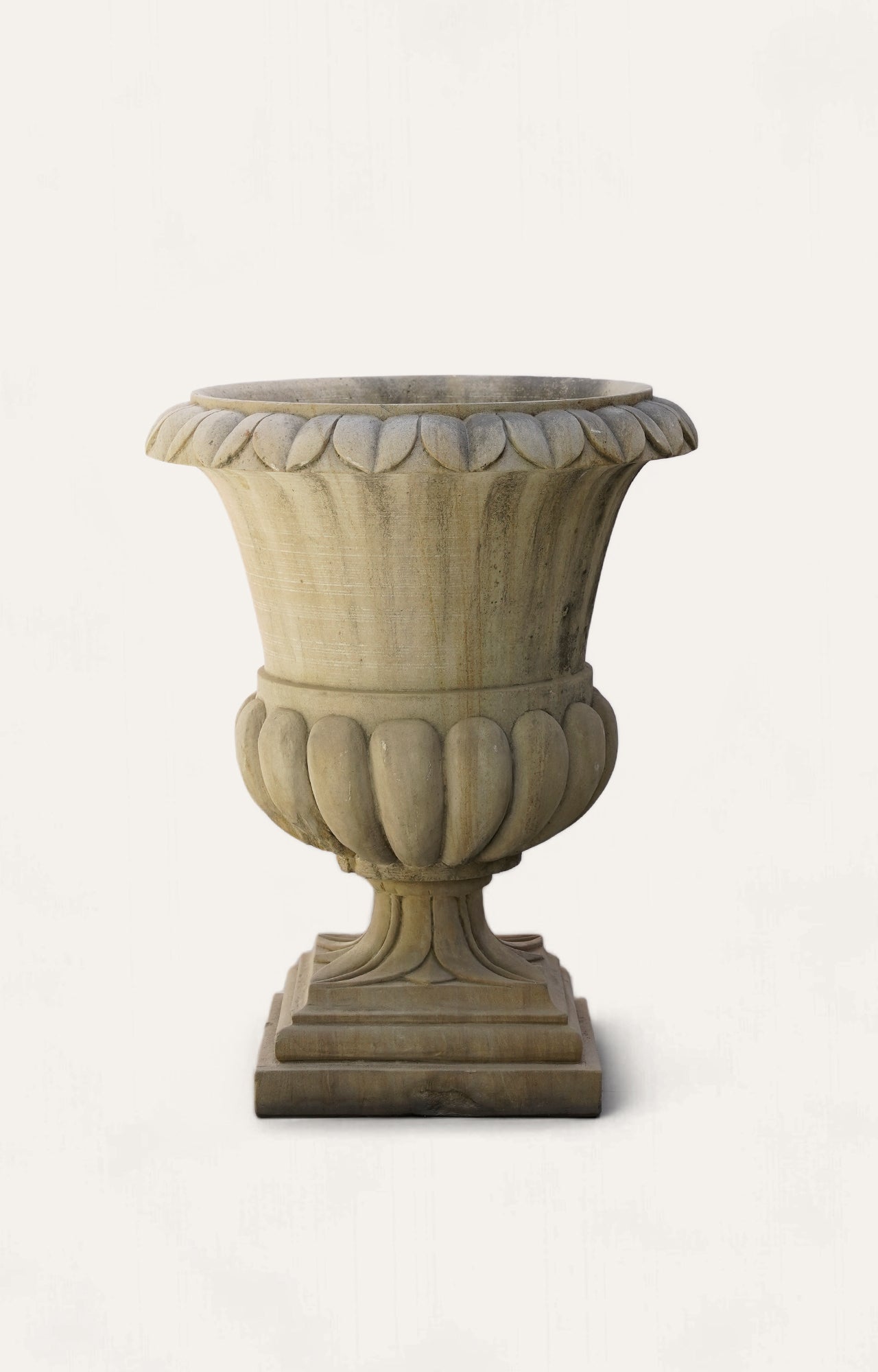 Curved Charm: The Sandstone Planter with a Twist