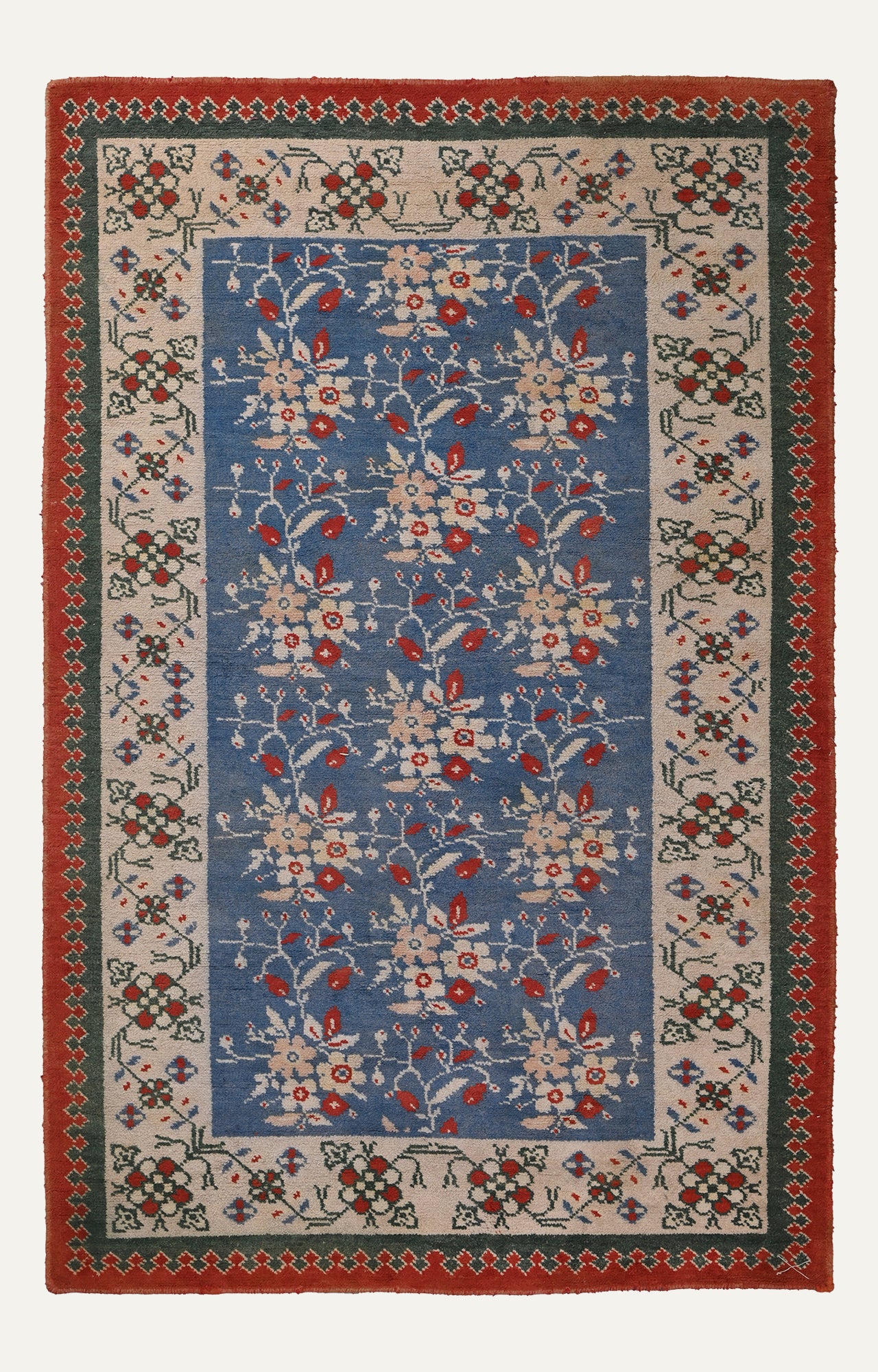 5 x 8 Ft Beautiful Blue base handknotted Agra Carpet with flowers all over.