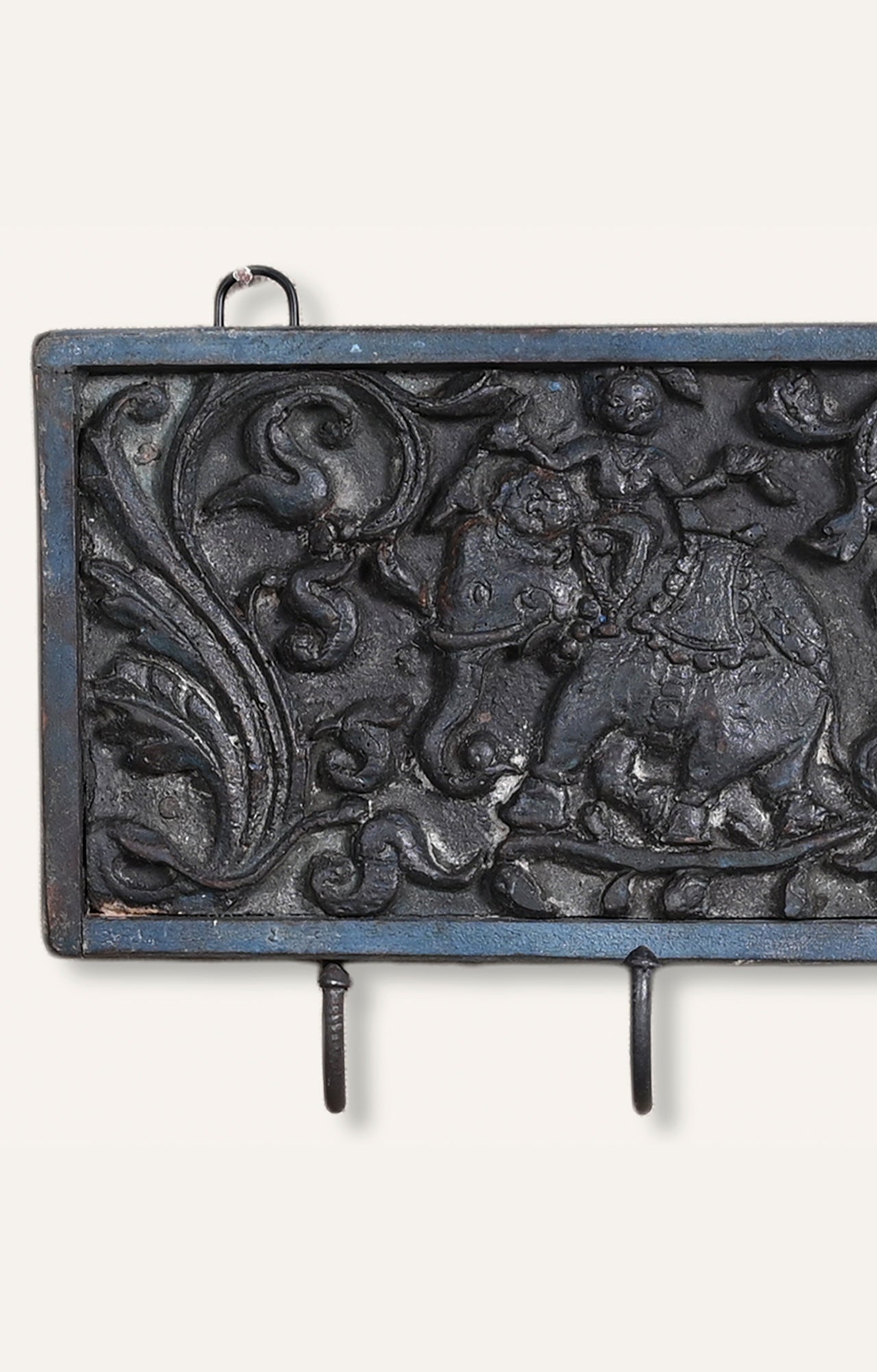 Carved Wooden Panel with Central Figure Flanked by Elephant