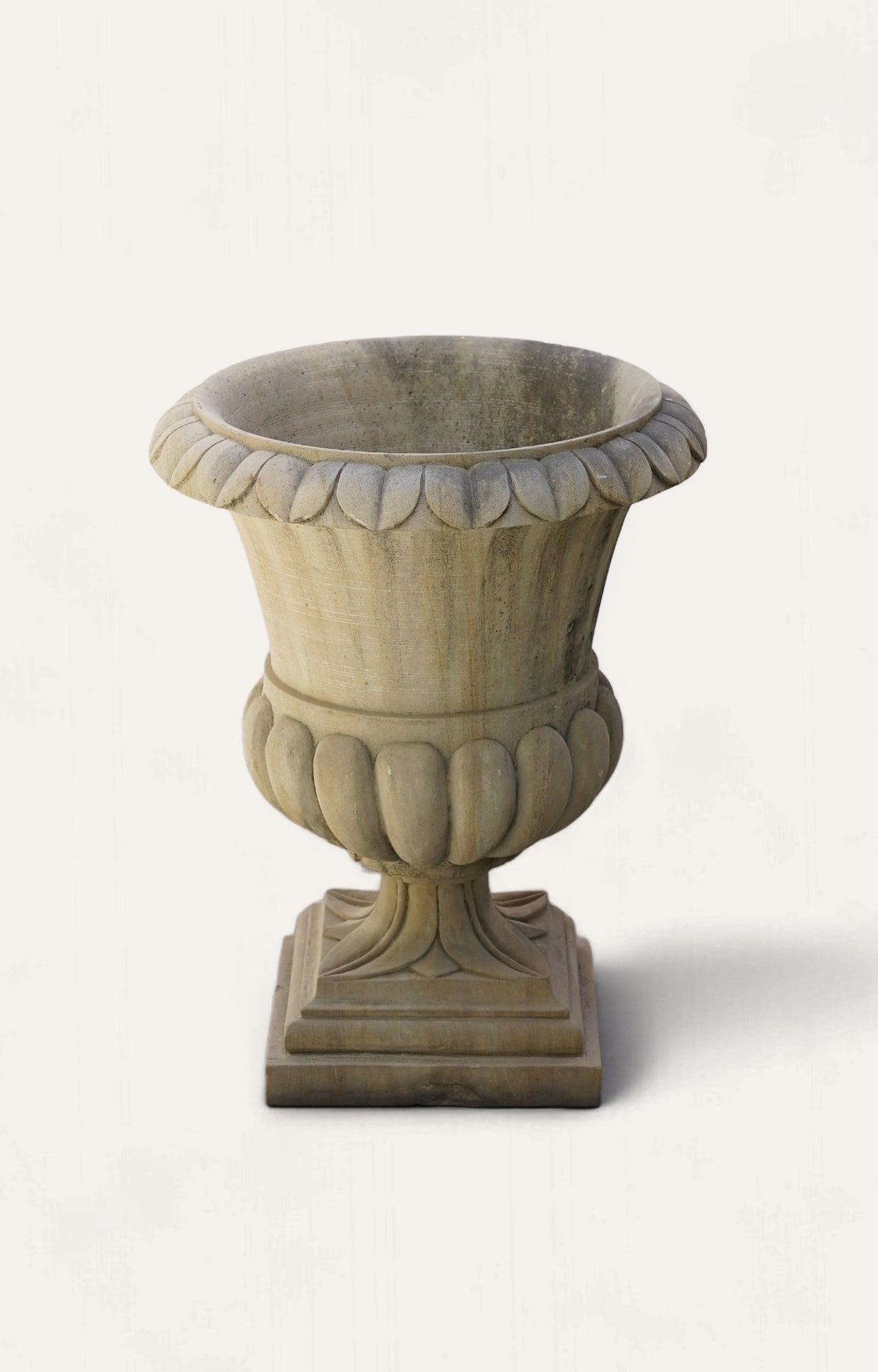 Curved Charm: The Sandstone Planter with a Twist