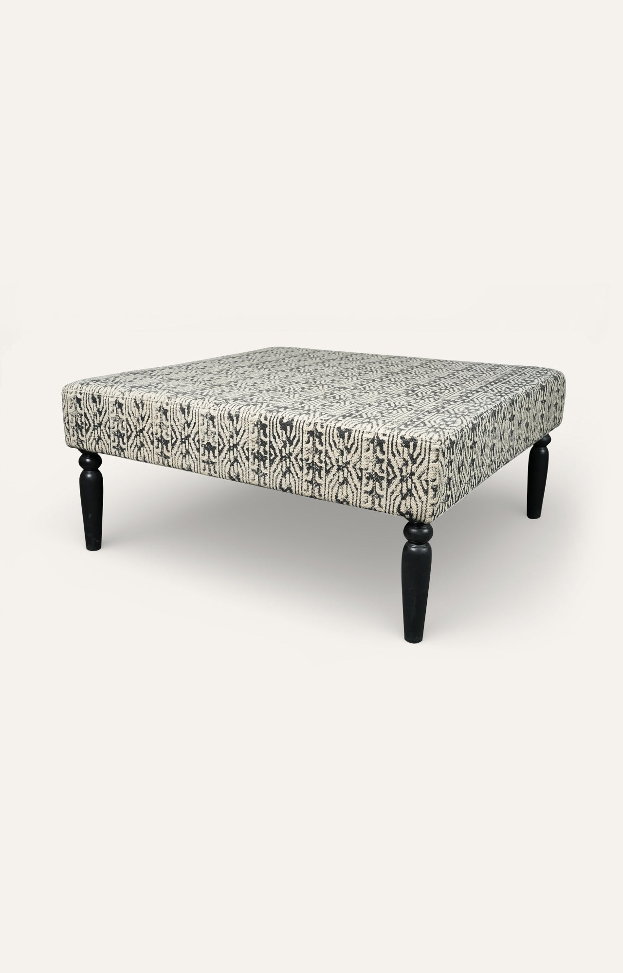 Ikat-Print Upholstered Square Ottoman with Black Turned Legs