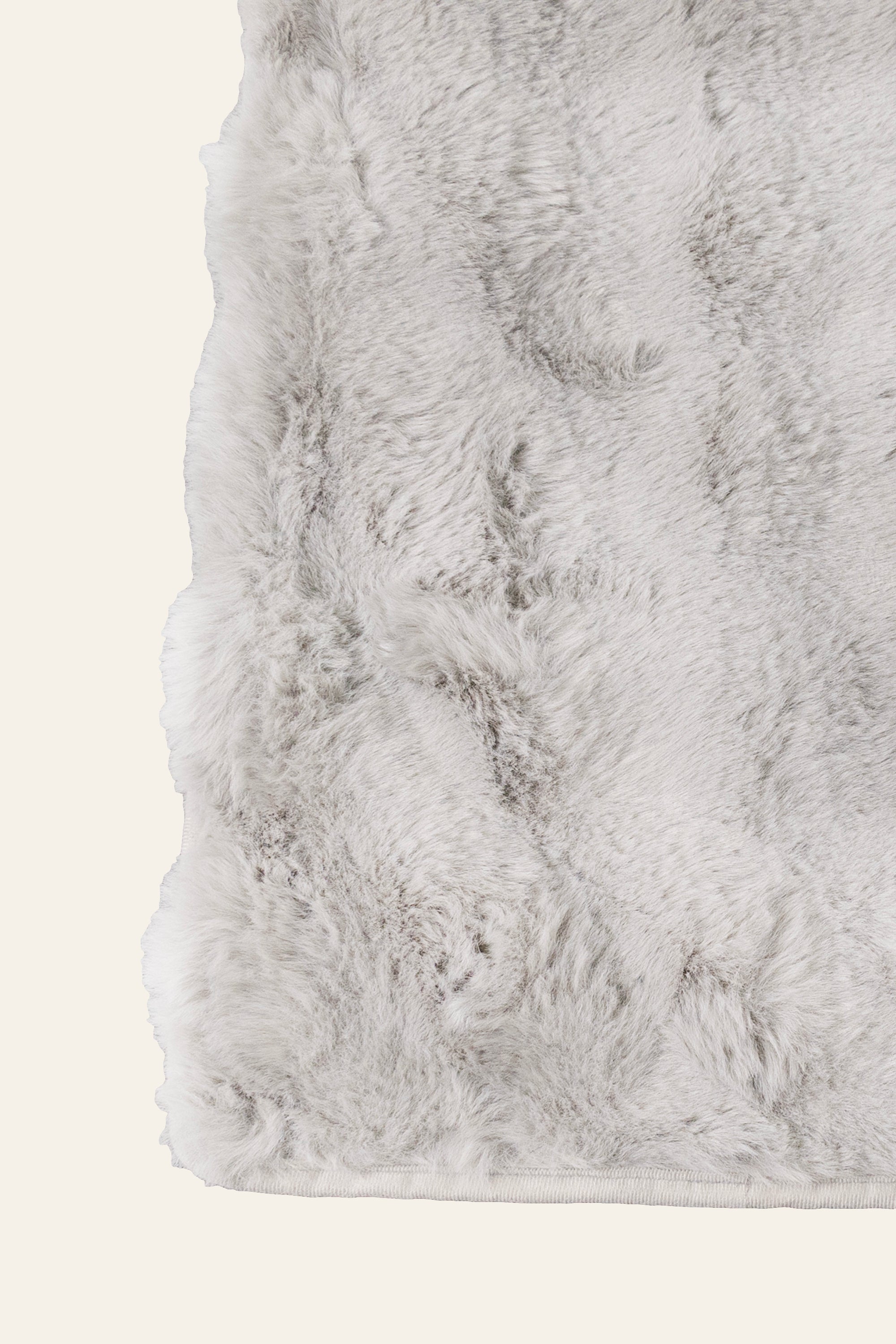 Soft Grey Fur Bed Throw for Modern Interiors