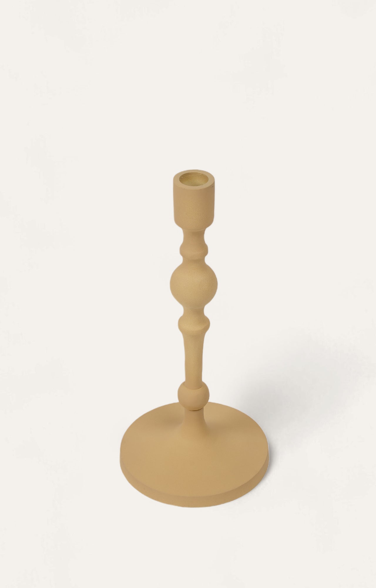 Twisted Charm: The Rustic Sophistication of the Knotted Metal Candlestand