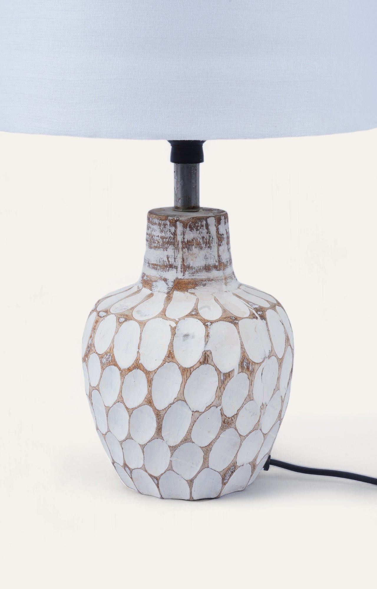 Thumb pressed table lamp