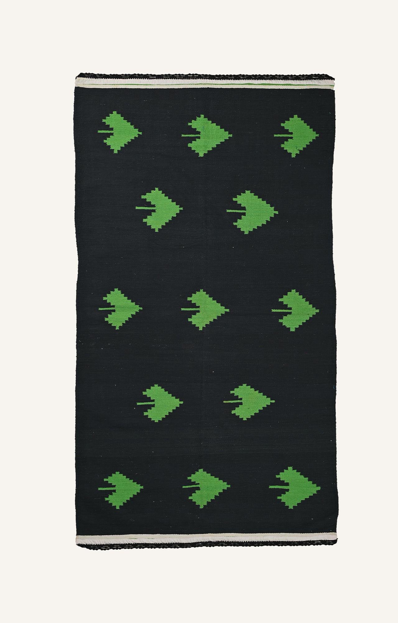 Handwoven Black rug with green spade motifs