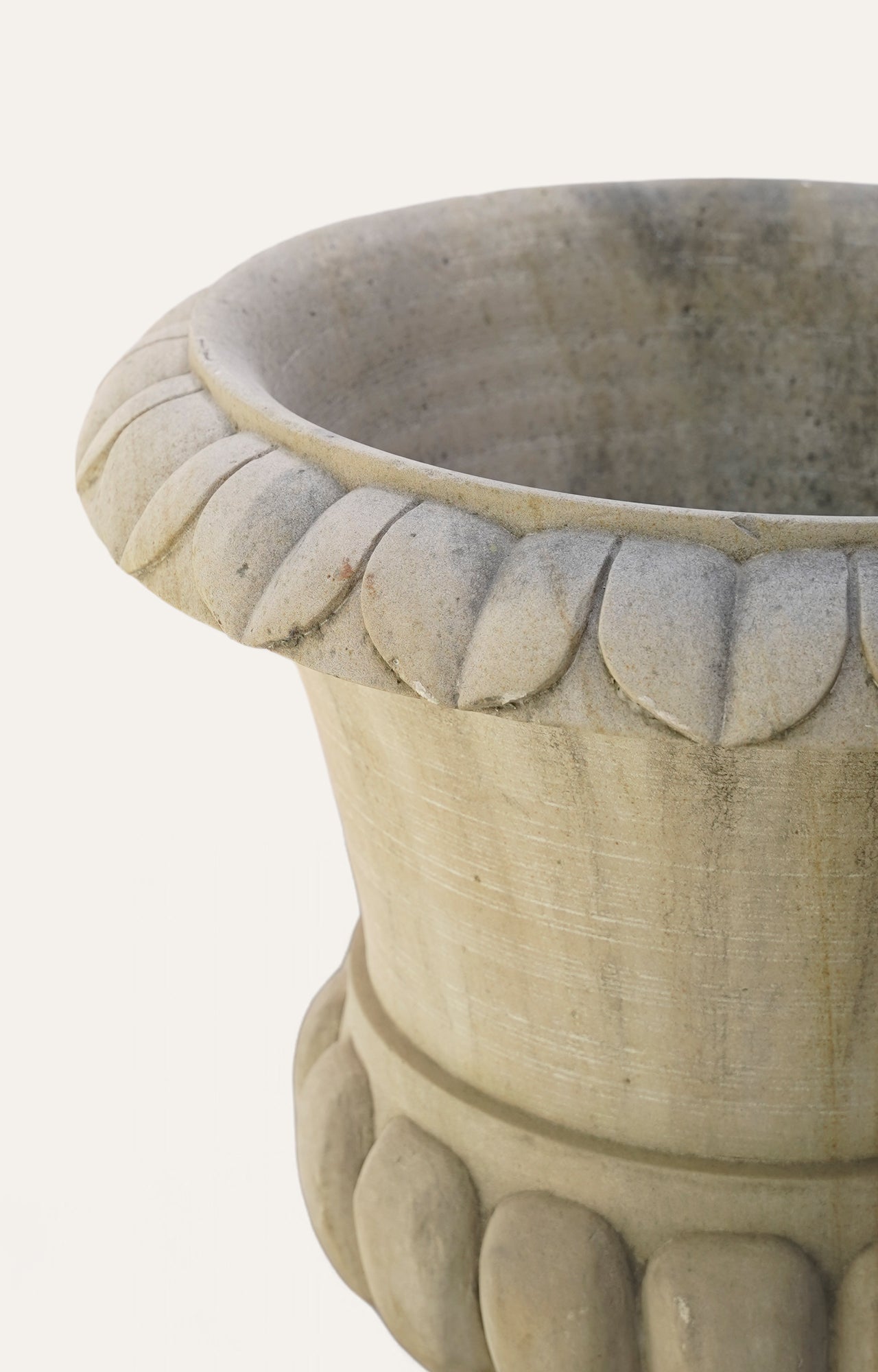 Curved Charm: The Sandstone Planter with a Twist