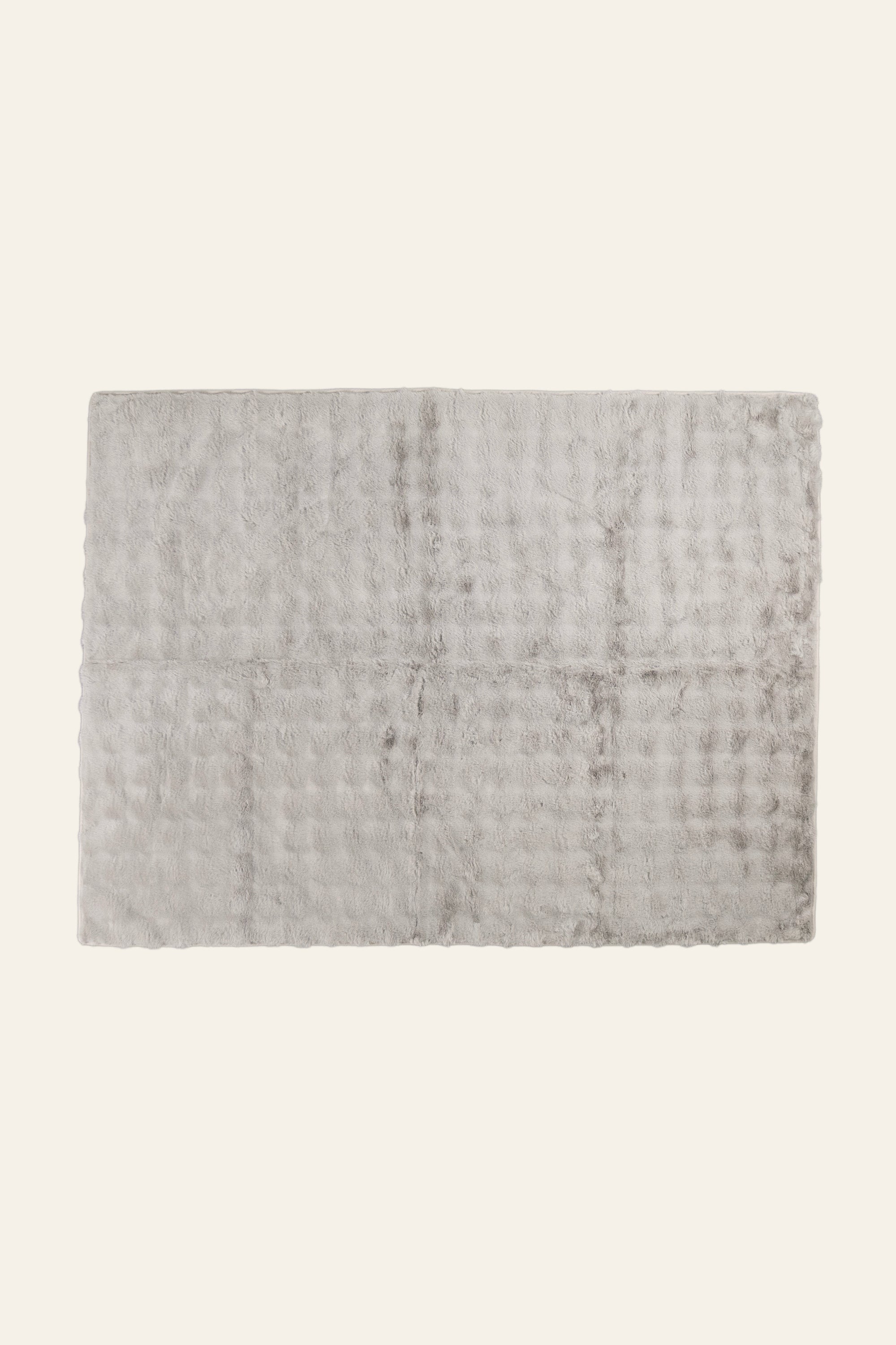 Soft Grey Fur Bed Throw for Modern Interiors