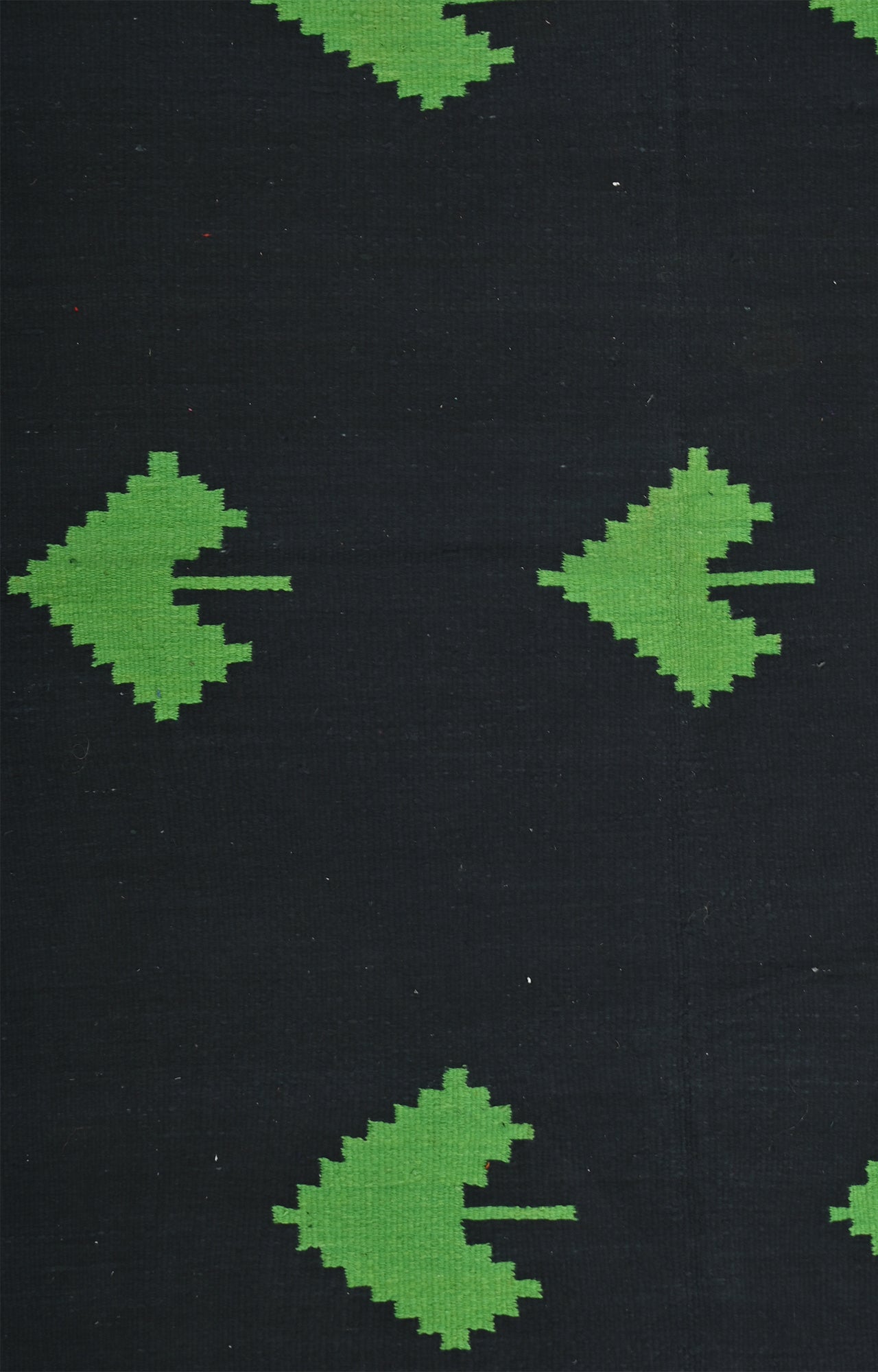 Handwoven Black rug with green spade motifs