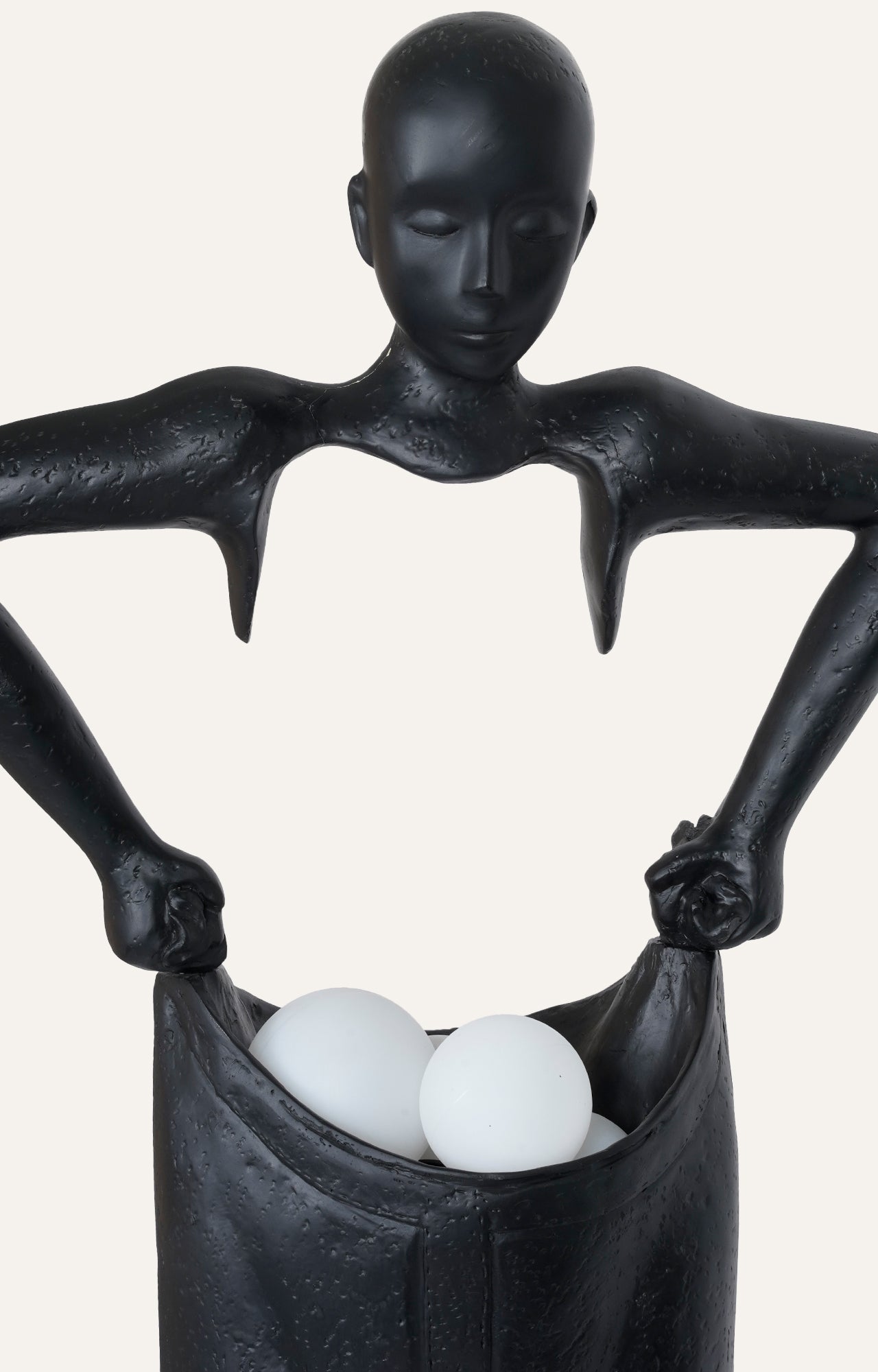 A body Sculpture Holding Floor Lamp