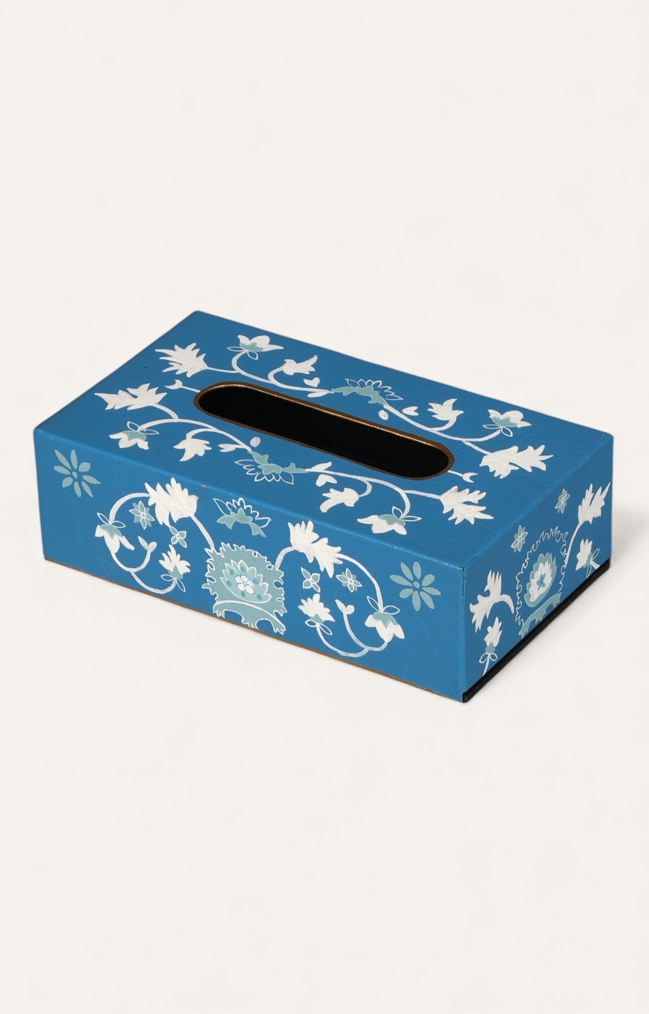 Blue tissue box with floral patterns