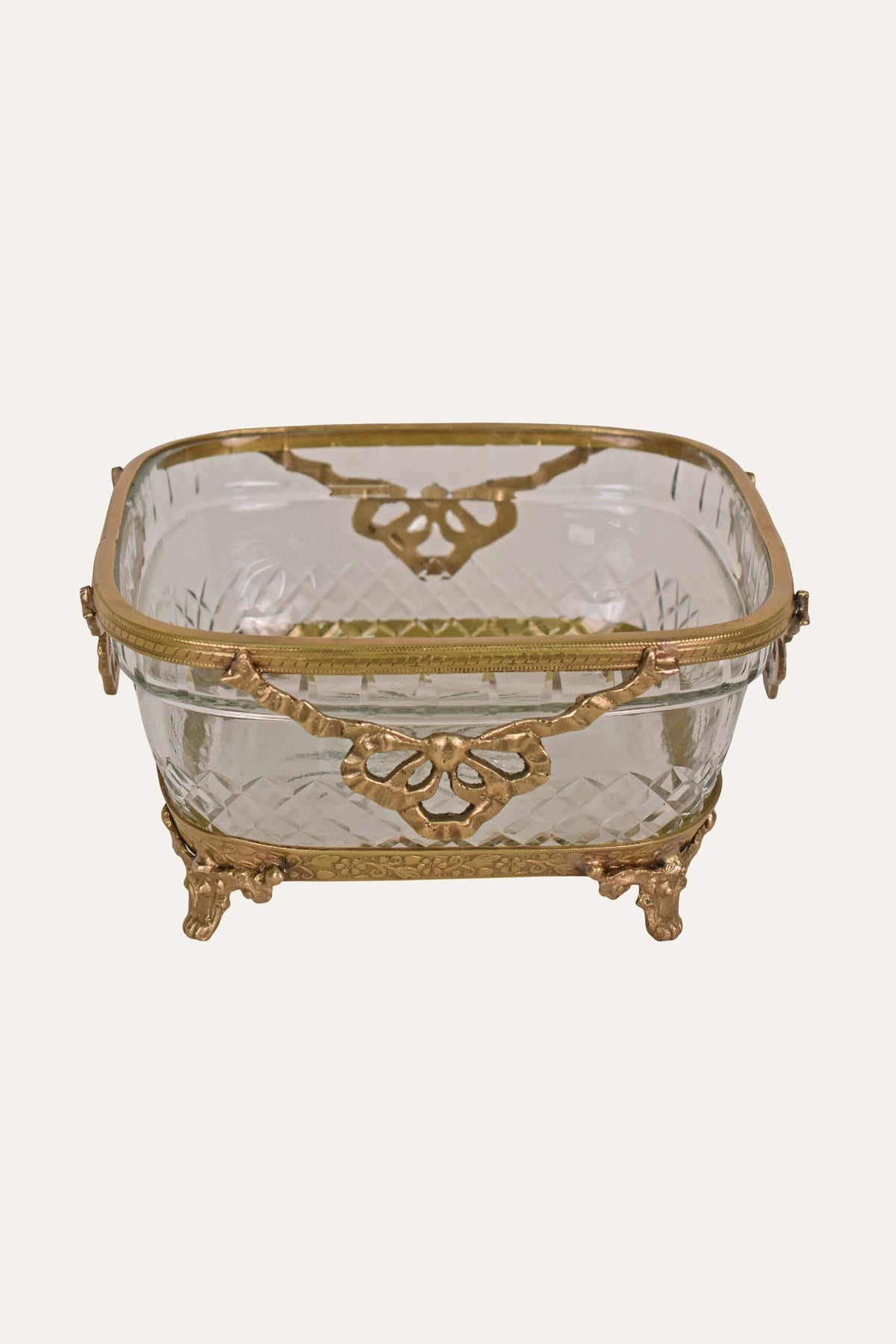 Brass and cut glass decorative bowl with ornate frame