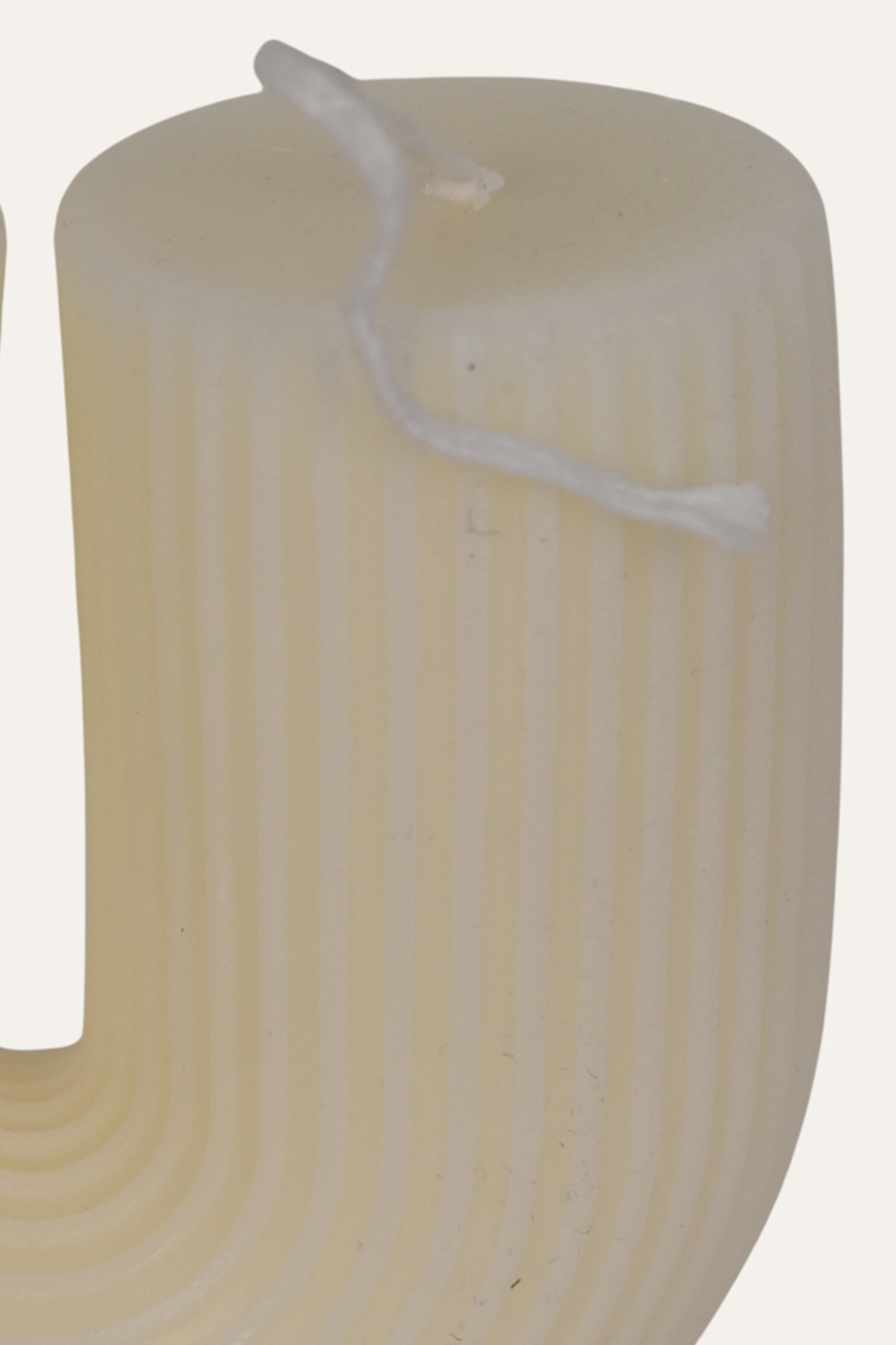 White candle with a wick 
