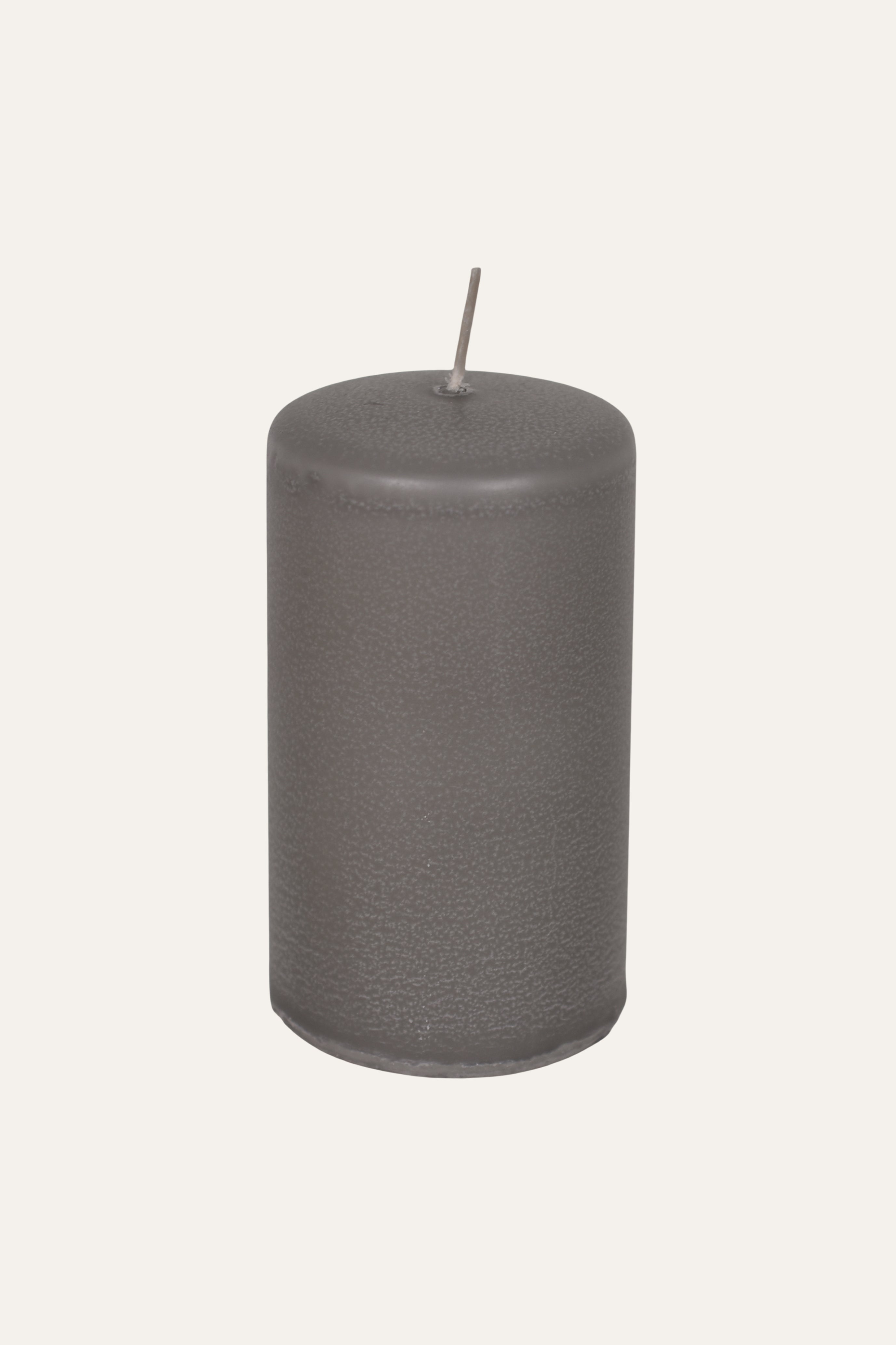 Gray cylindrical candle 