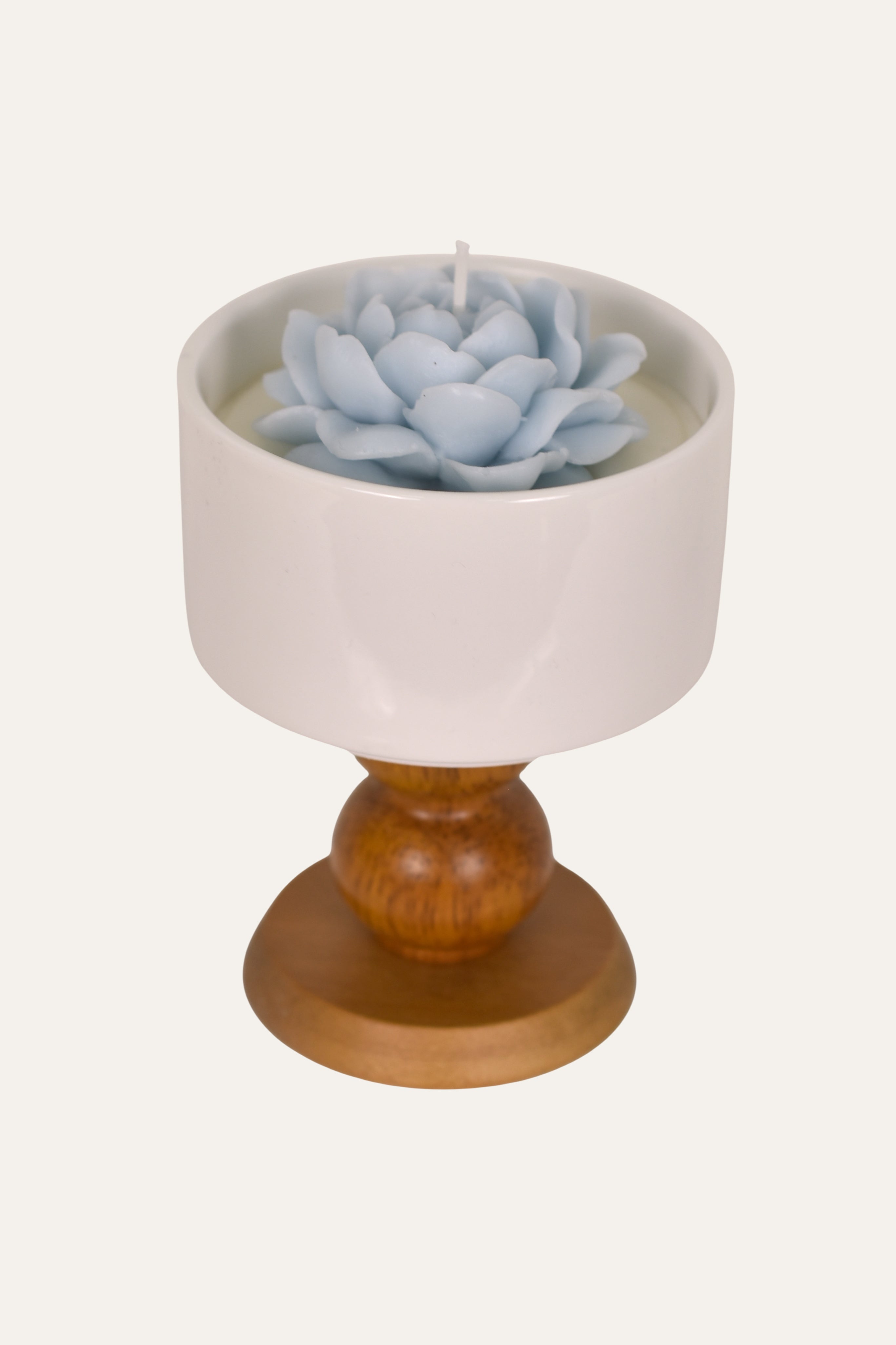 Candle in a decorative holder