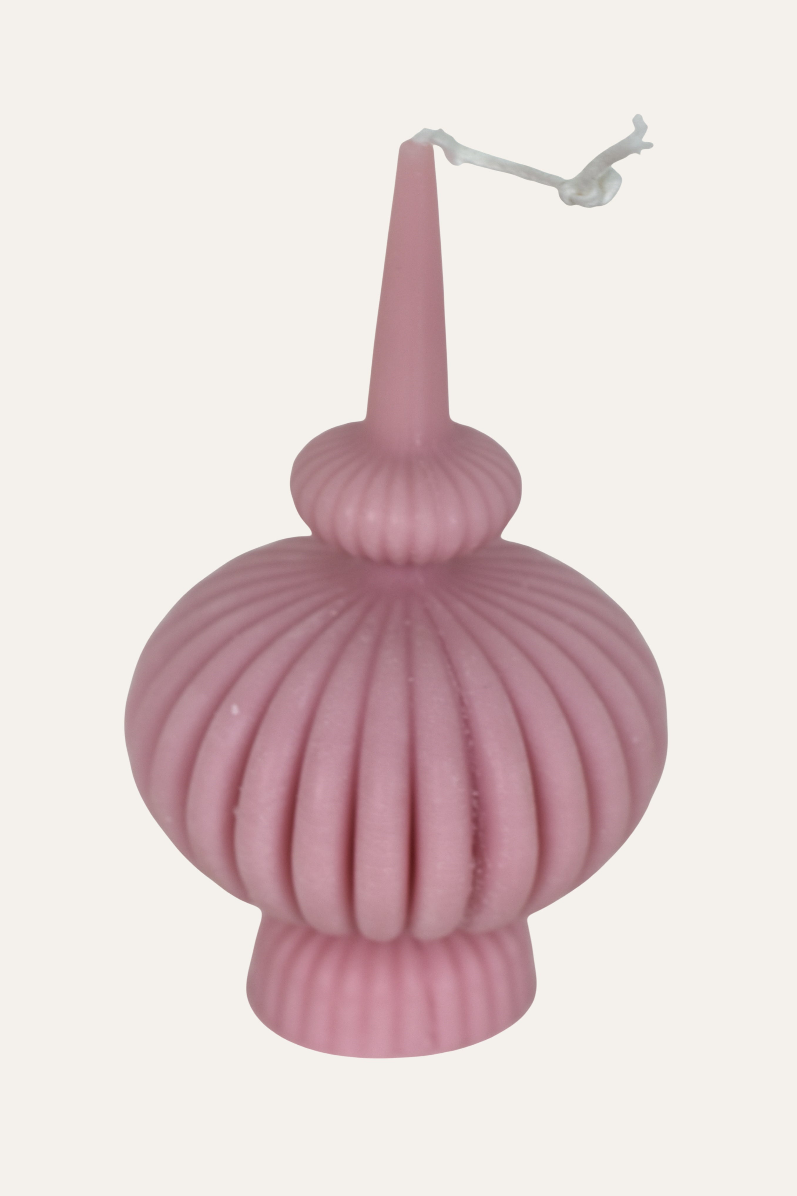 Pink ribbed candle