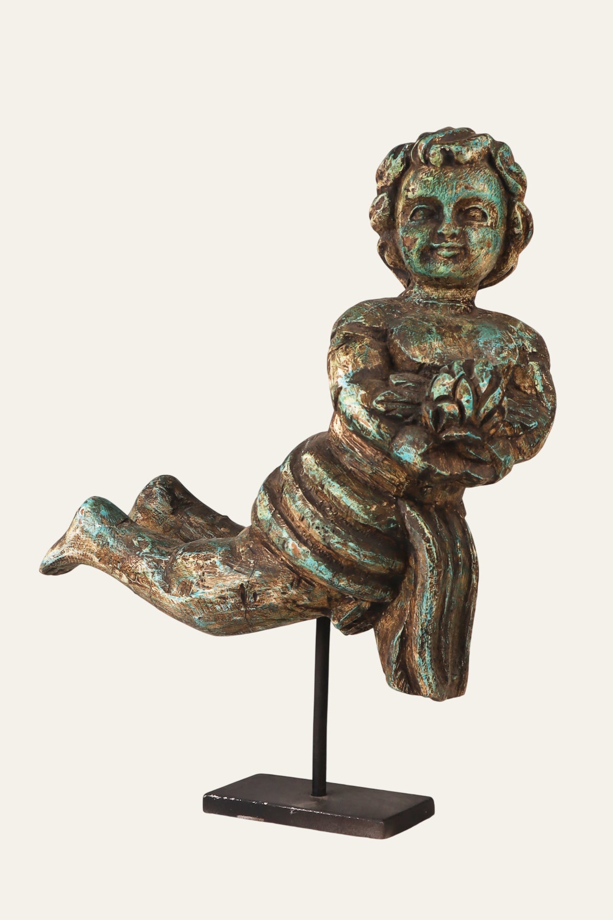 Cherub angel statue on matte black stand