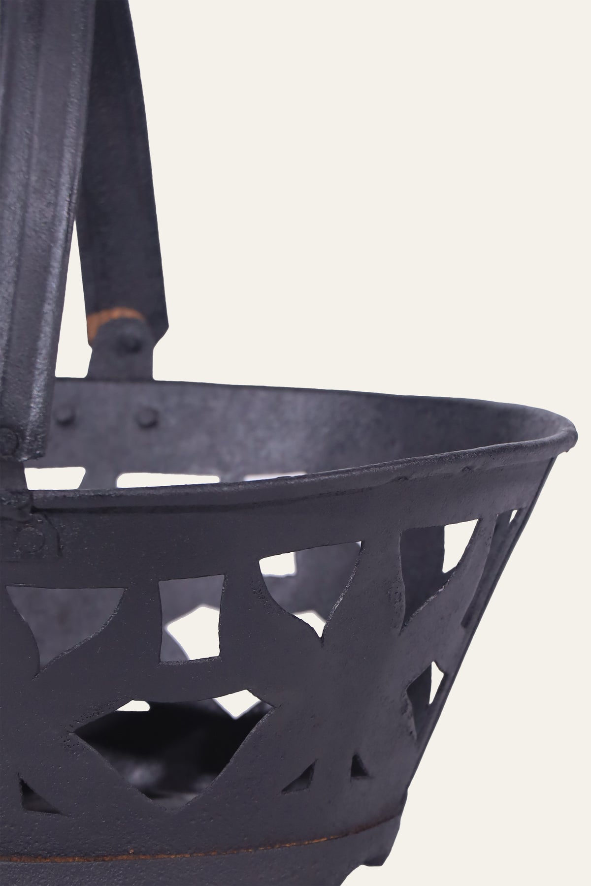 Compact black metal basket for display