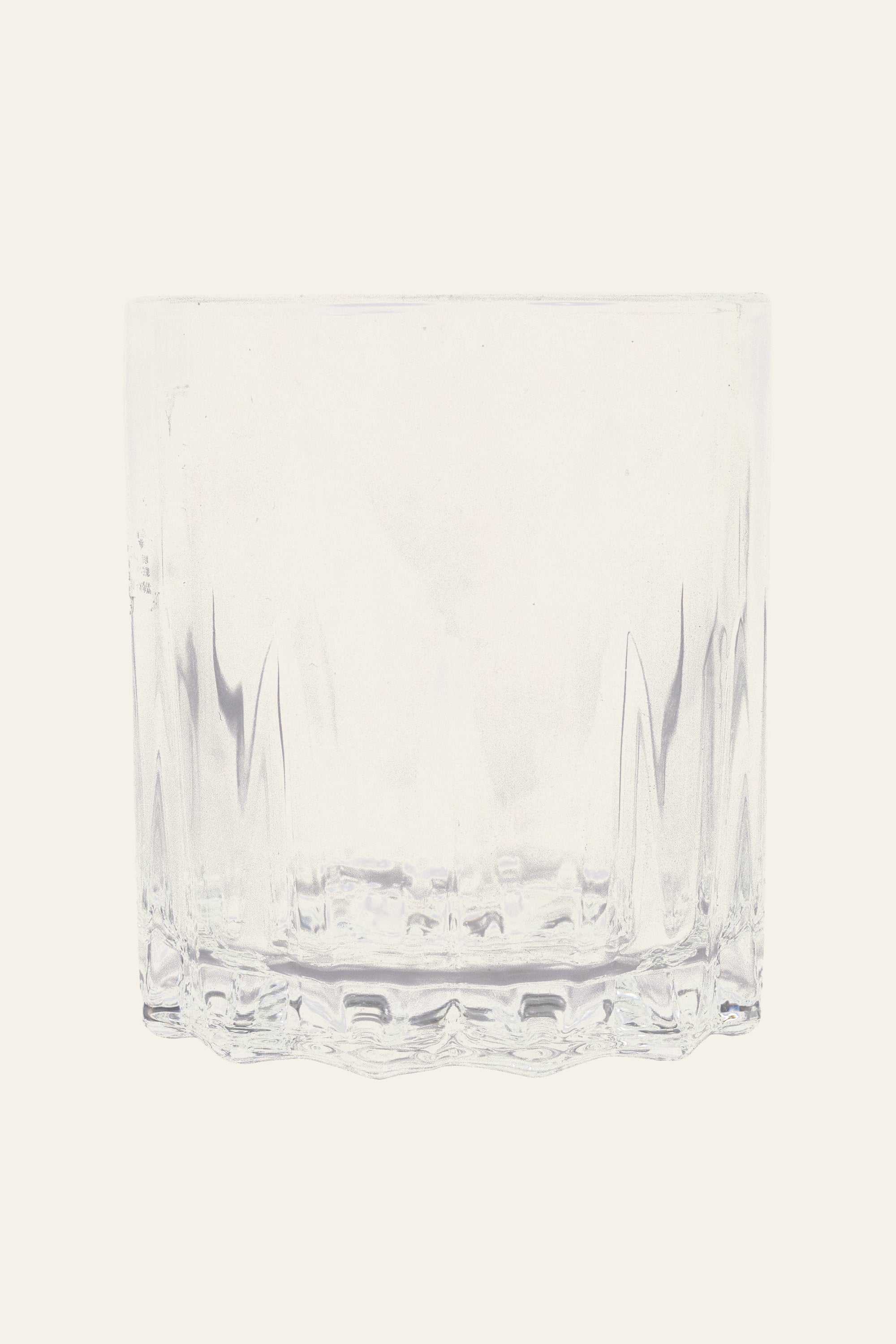 Crystal clear curved whiskey glass