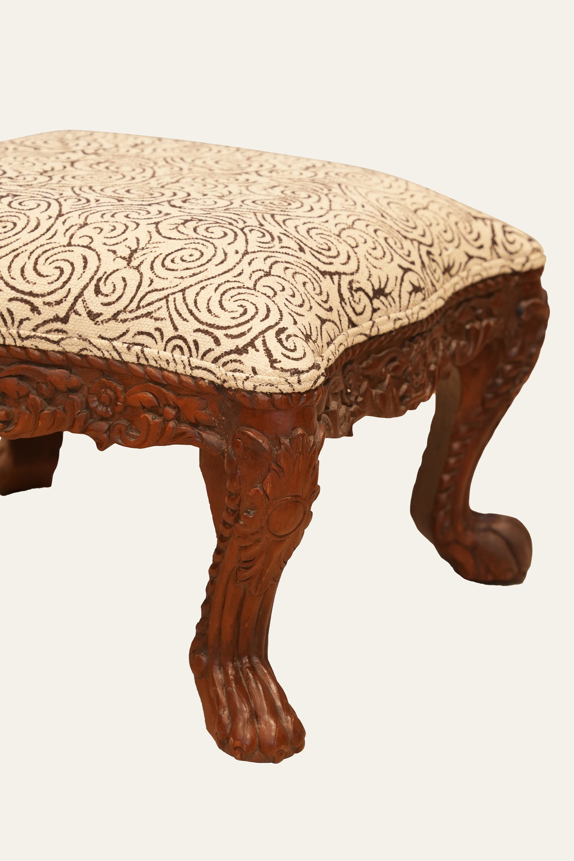 Carved Upholstered Wooden Stool with Ornate Floral Frame