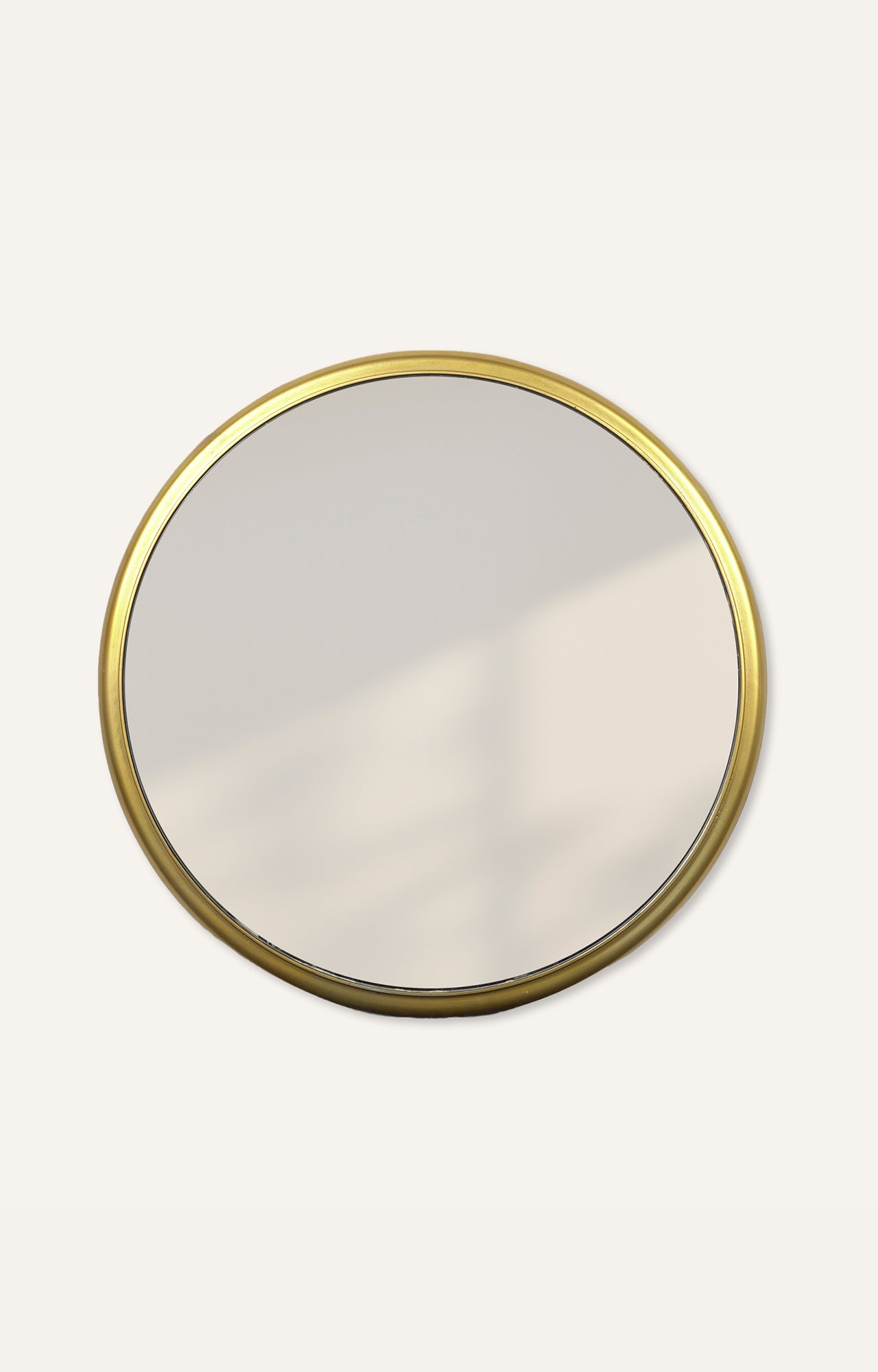 Gold finish metal round frame mirror