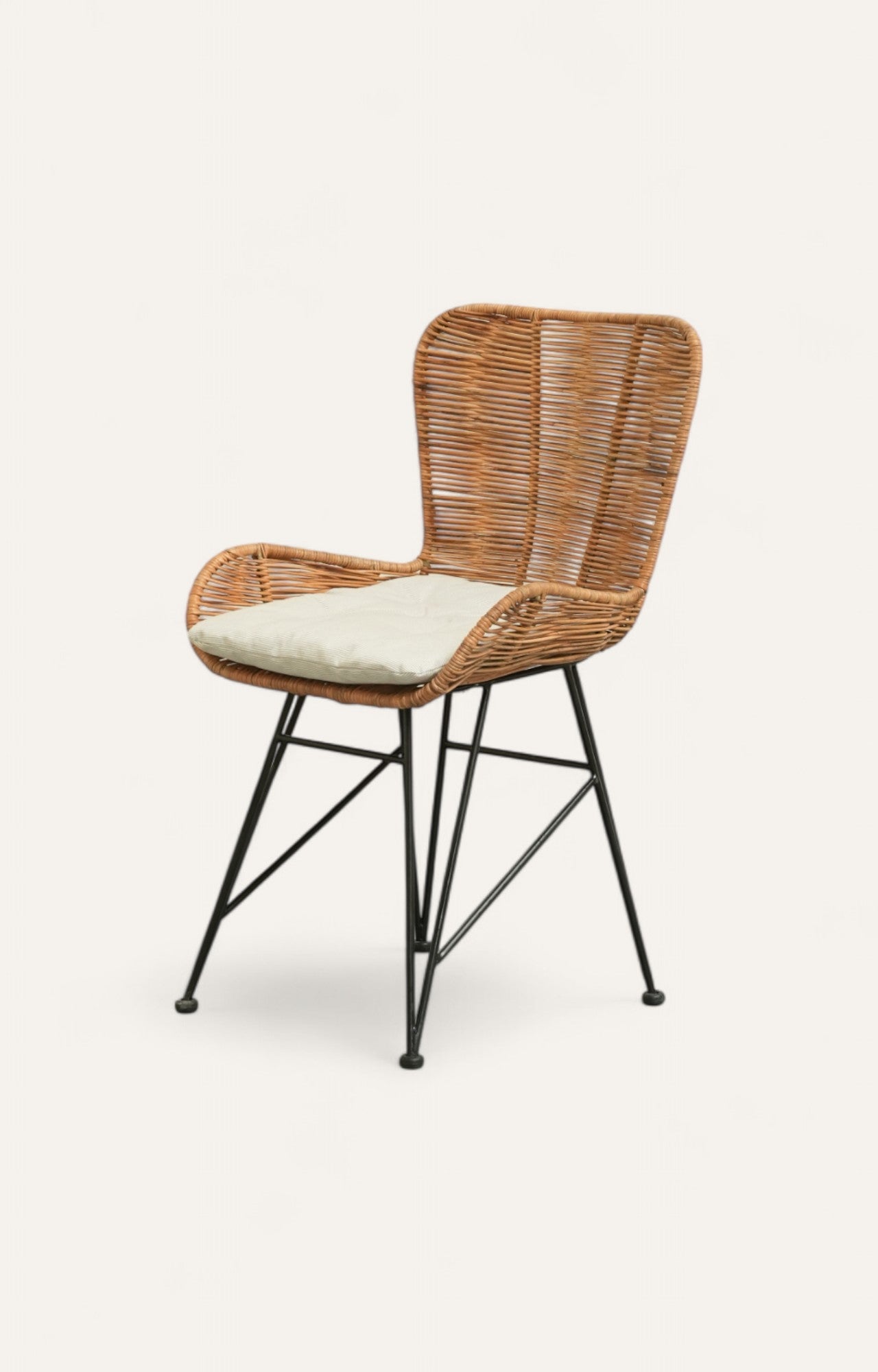 Lounge chair with a natural woven rattan seat and back featuring Jawid detailing, supported by a black iron frame.