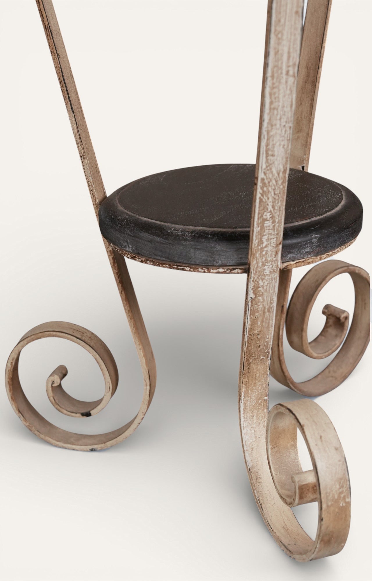 Round Metal Accent Table with Scroll Base