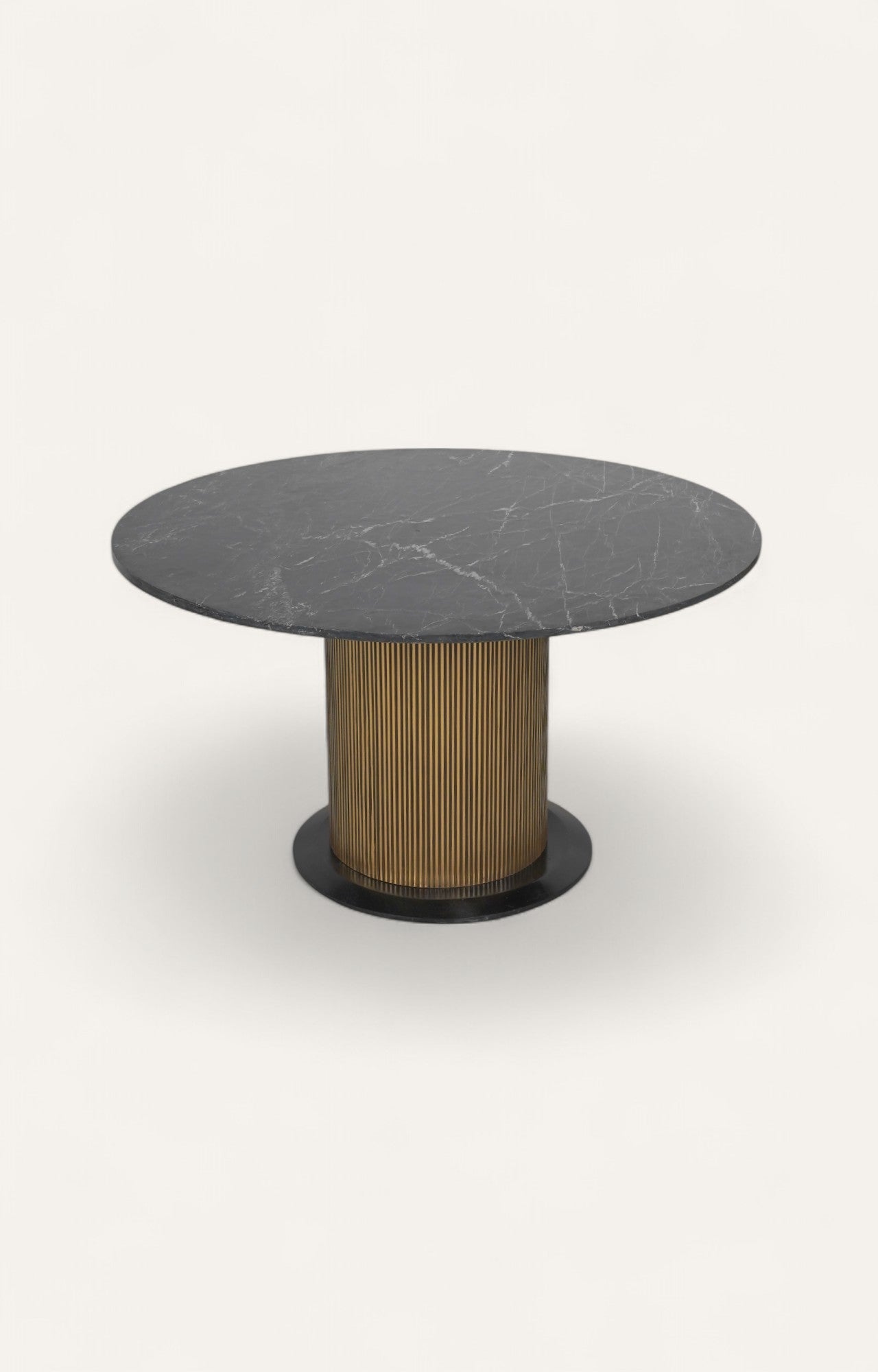  Round dining table with fluted brass base and black marble top