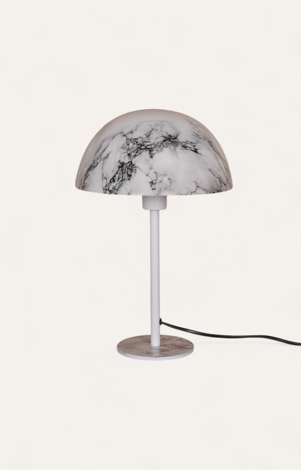 Elegant table lamp with a white marble finish on the shade and base.