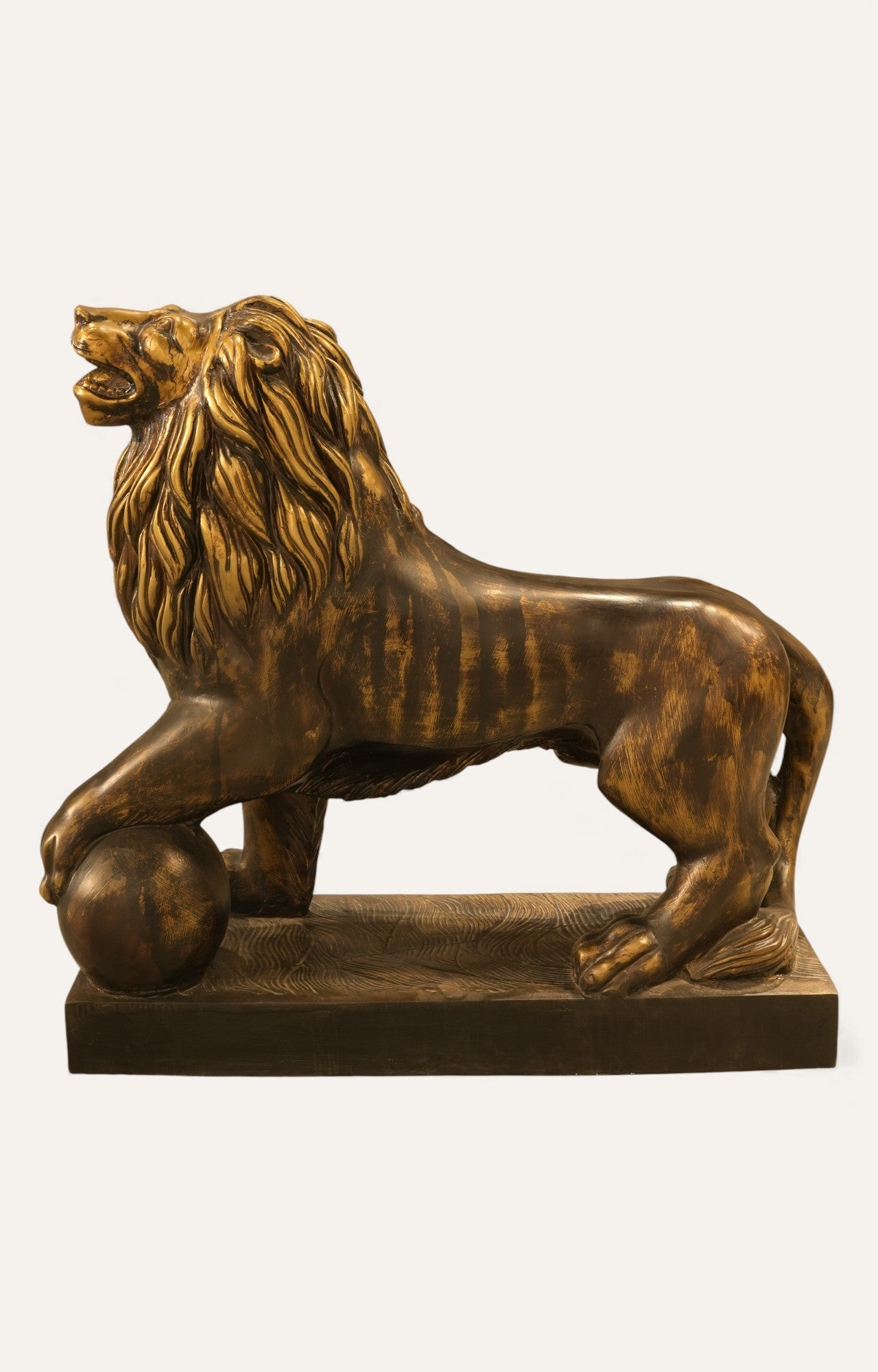 Majestic Bronze Finish Lion Statue with Paw on Ball