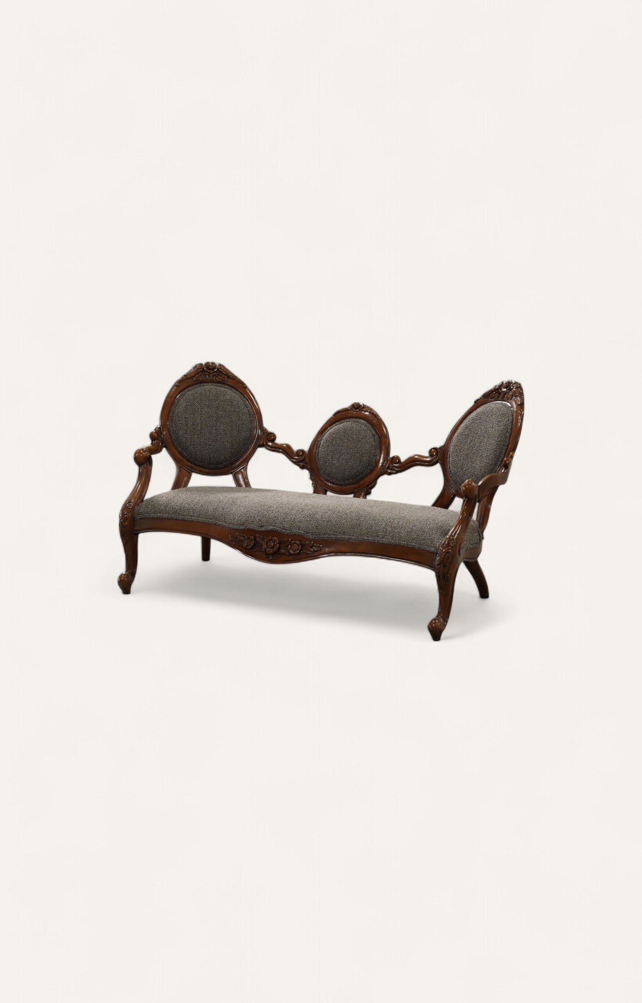 Victorian style teak wood sofa in dark oak