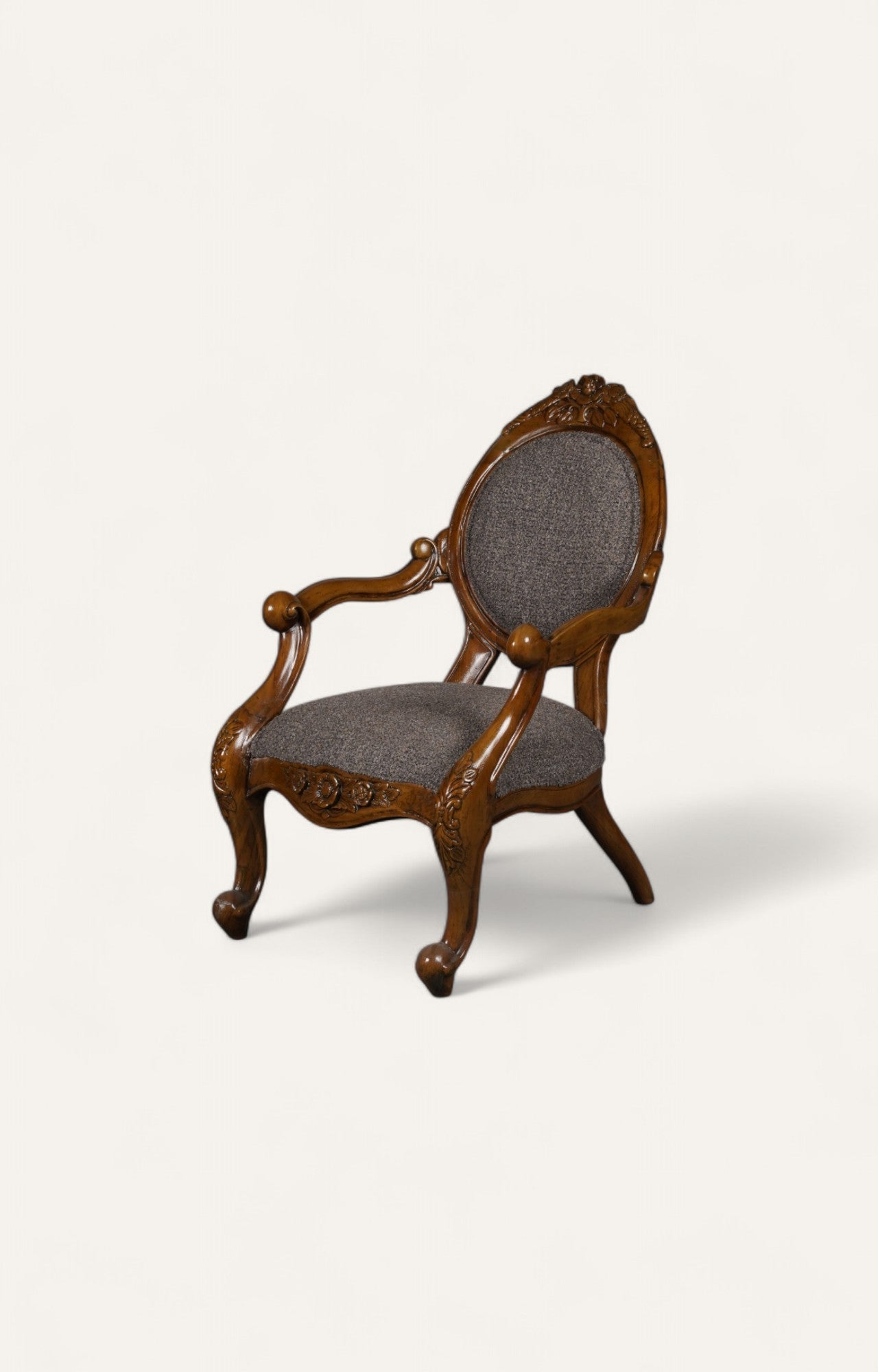 Victorian style teak wood armchair in dark oak