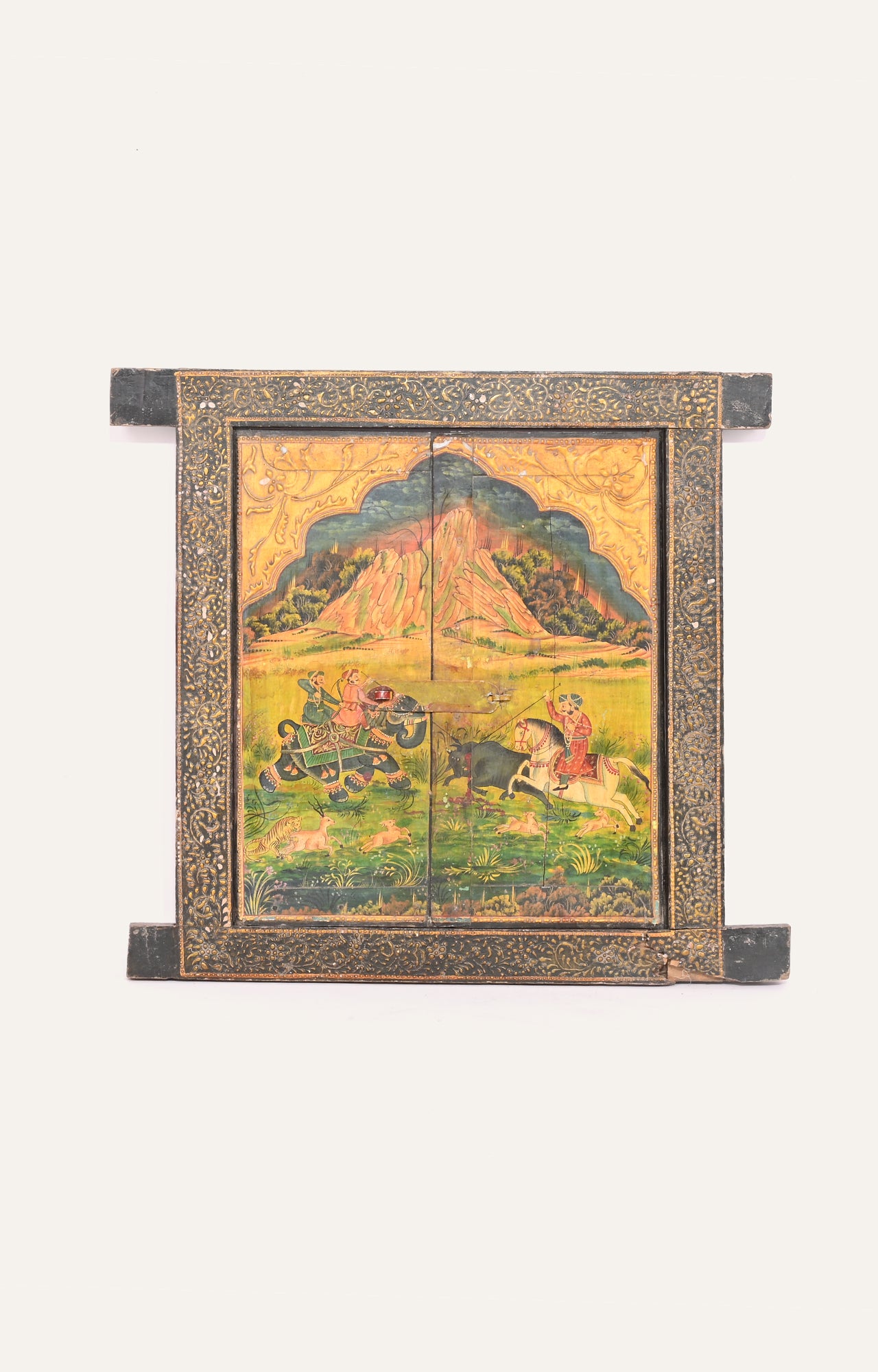 Detailed carved Wooden Panel with intricate borders, depicting a scene of shikaar from mughal era.