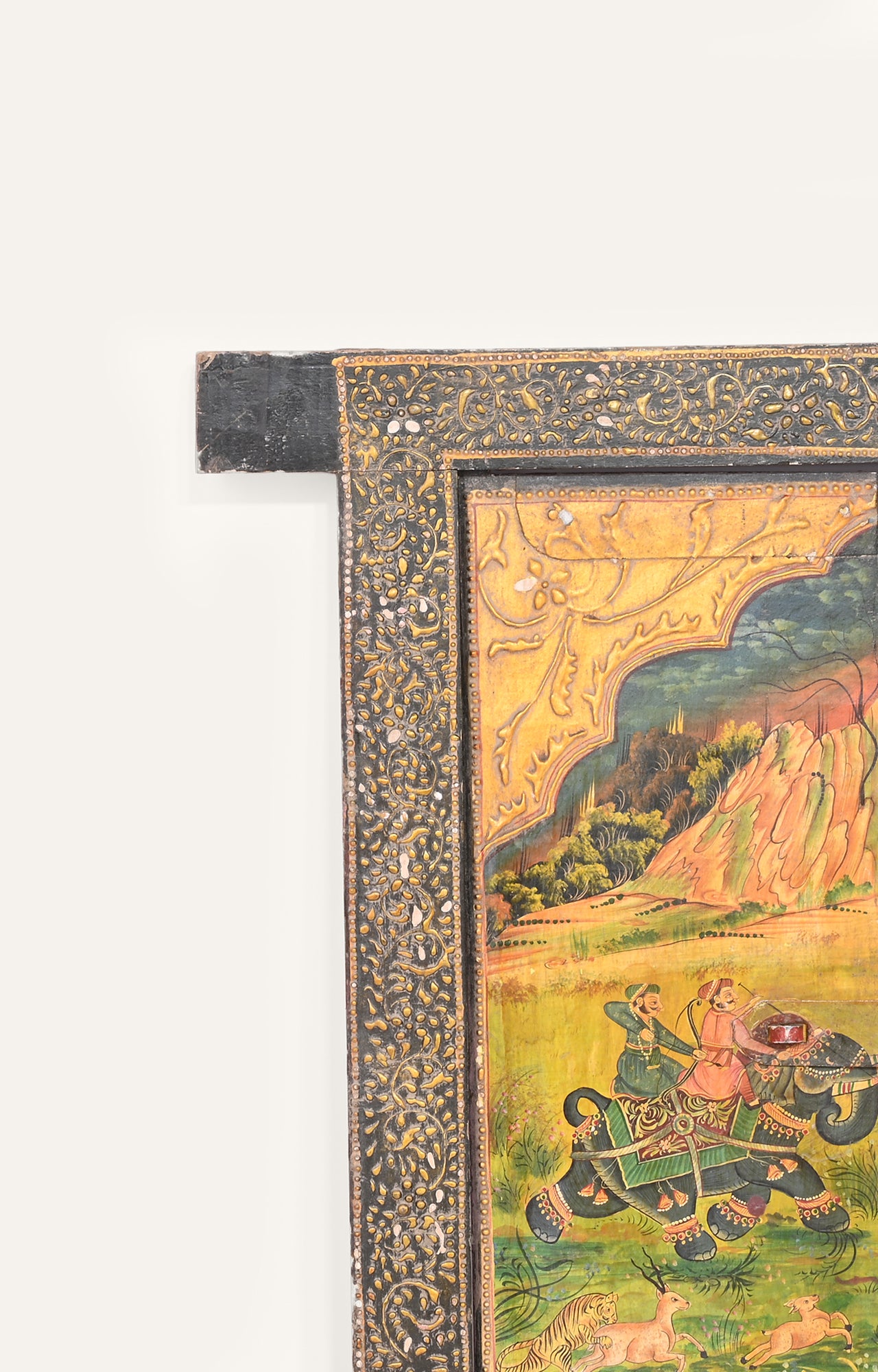 Detailed carved Wooden Panel with intricate borders, depicting a scene of shikaar from mughal era.