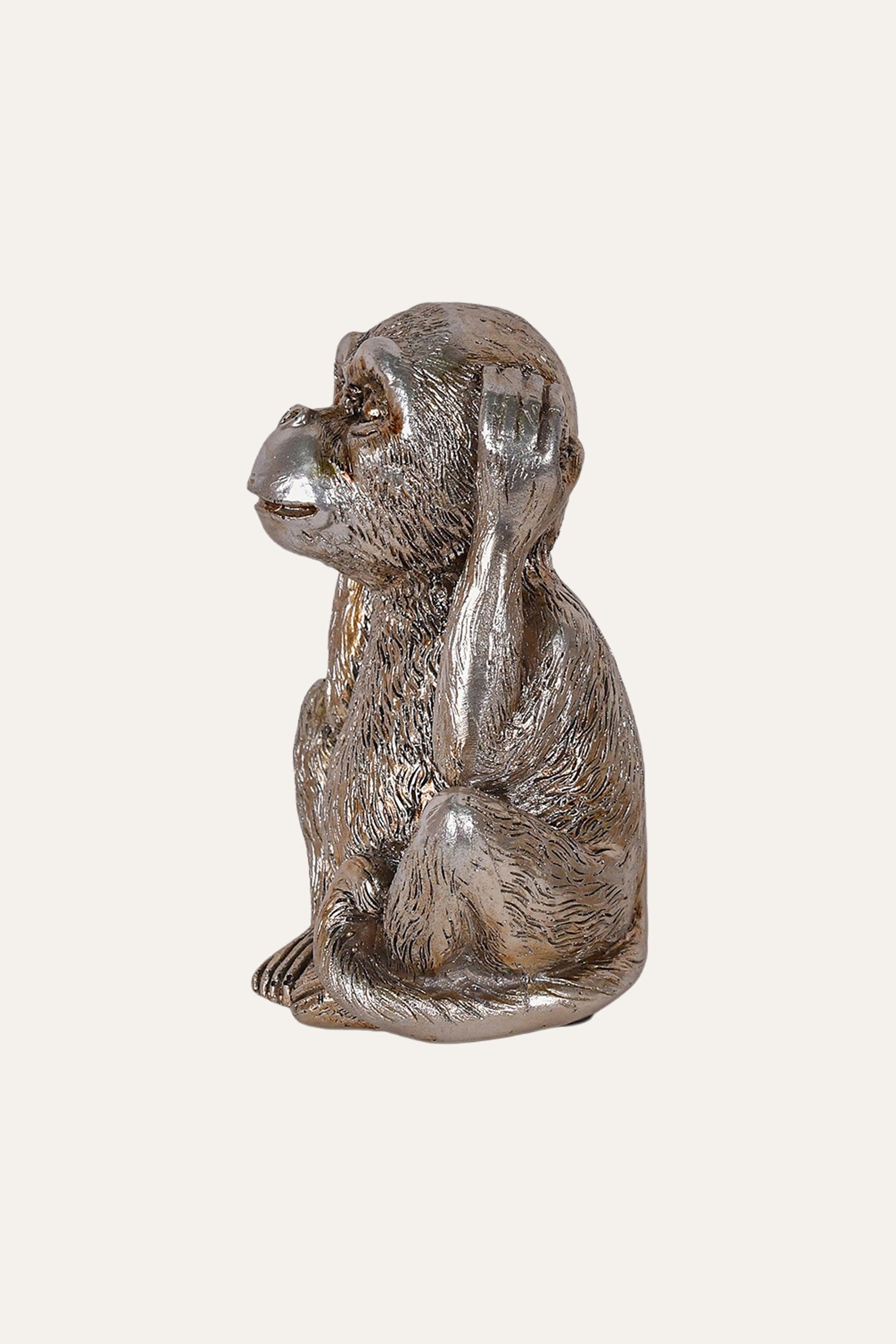 Silver monkey figurine