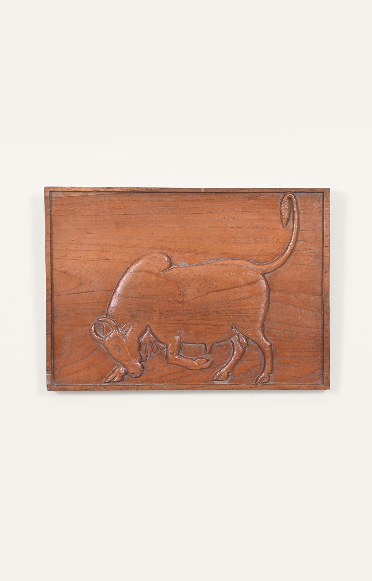 Carved Wooden Panel with Mythical Bull