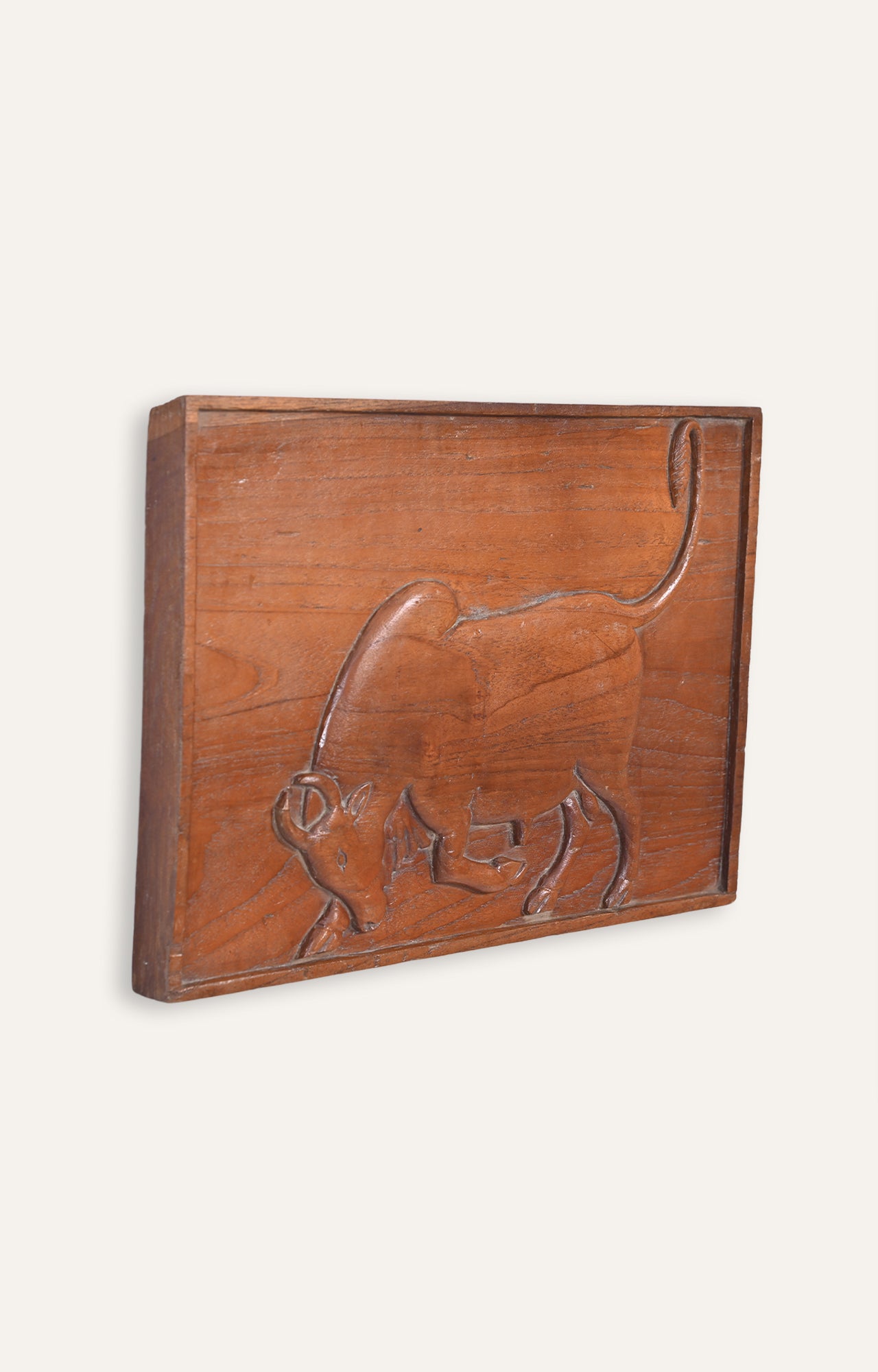 Carved Wooden Panel with Mythical Bull